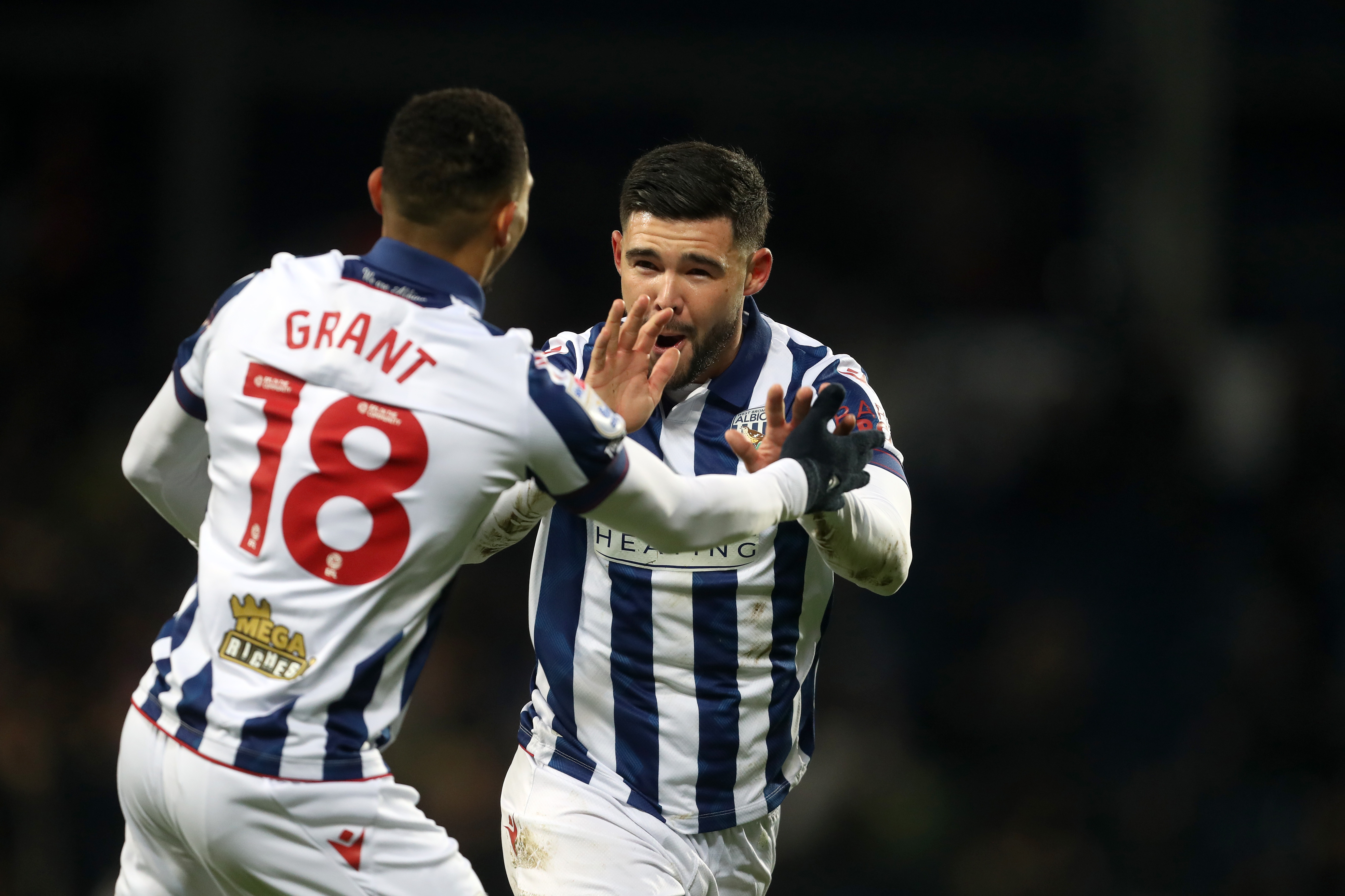 Alex Mowatt celebrates scoring against Coventry City with Karlan Grant 