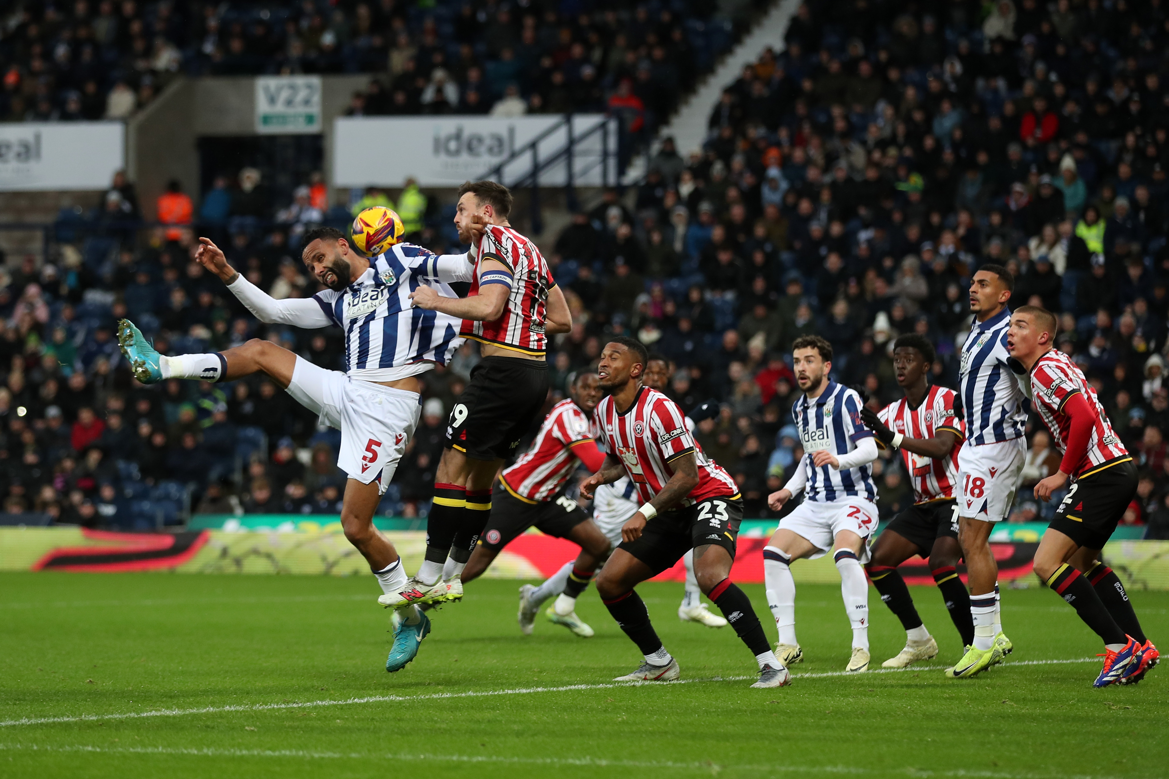 Kyle Bartley jumps to try and win a header against Sheffield United 