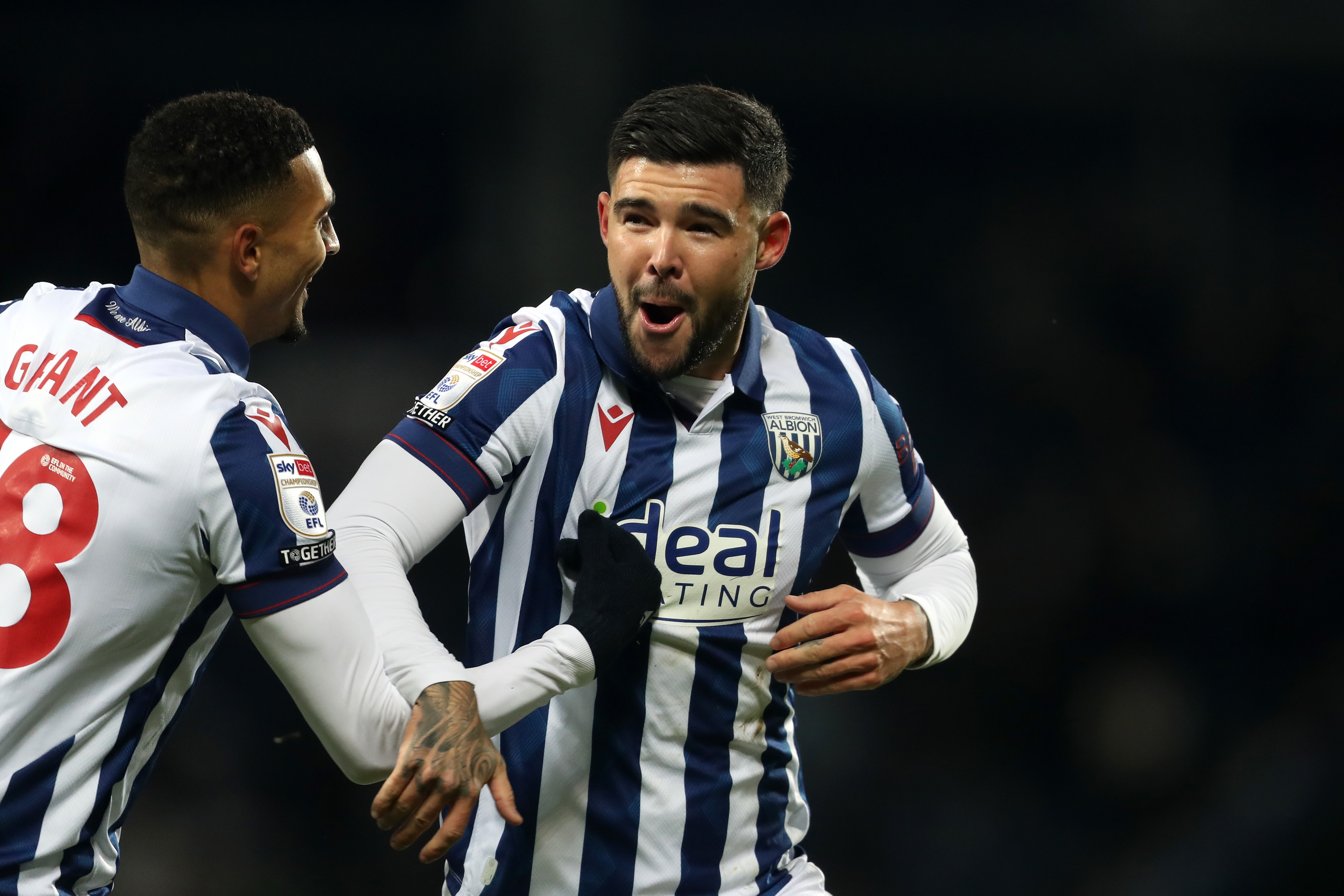 Alex Mowatt celebrates scoring against Coventry City with Karlan Grant 