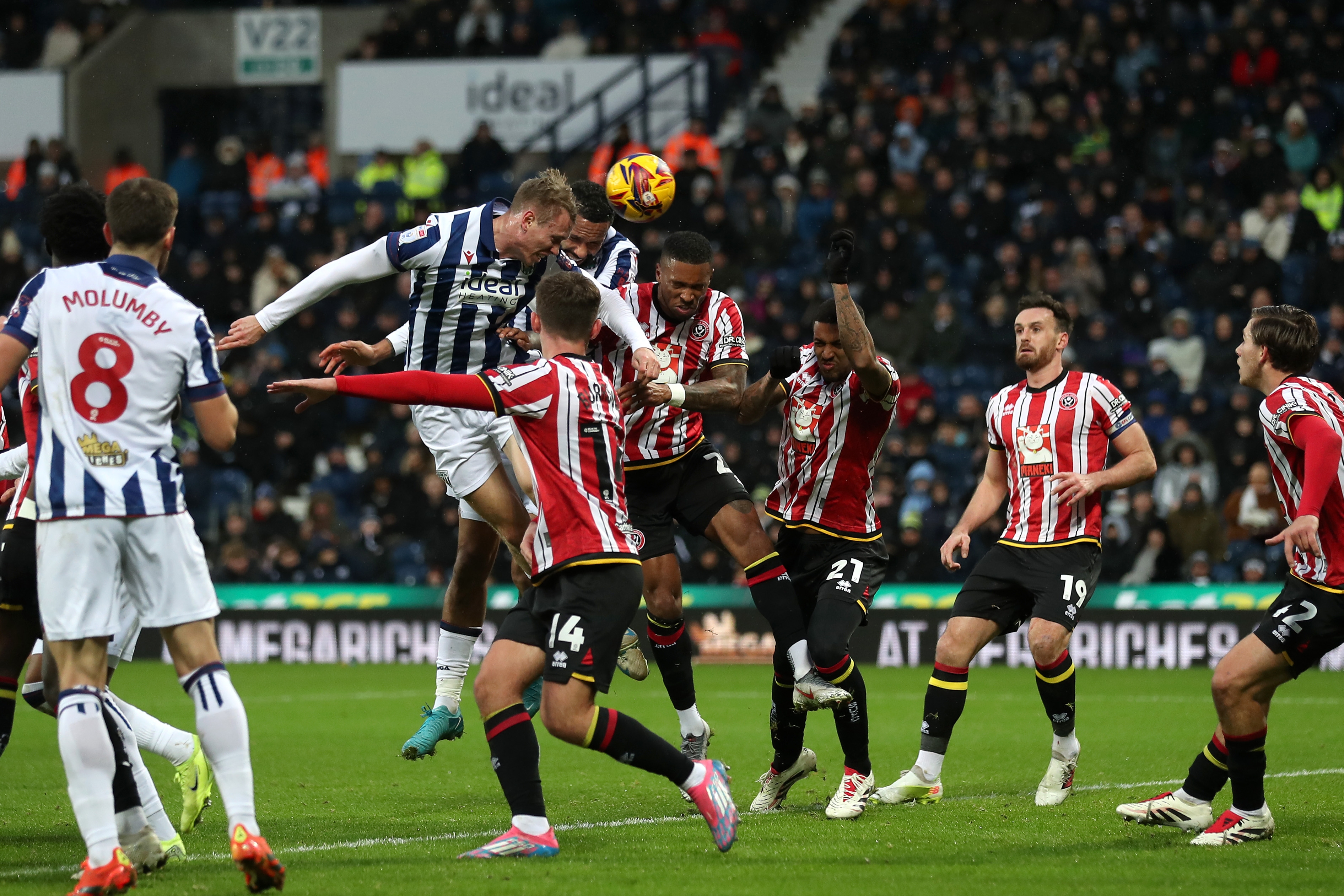 Torbjørn Heggem scores a header against Sheffield United 