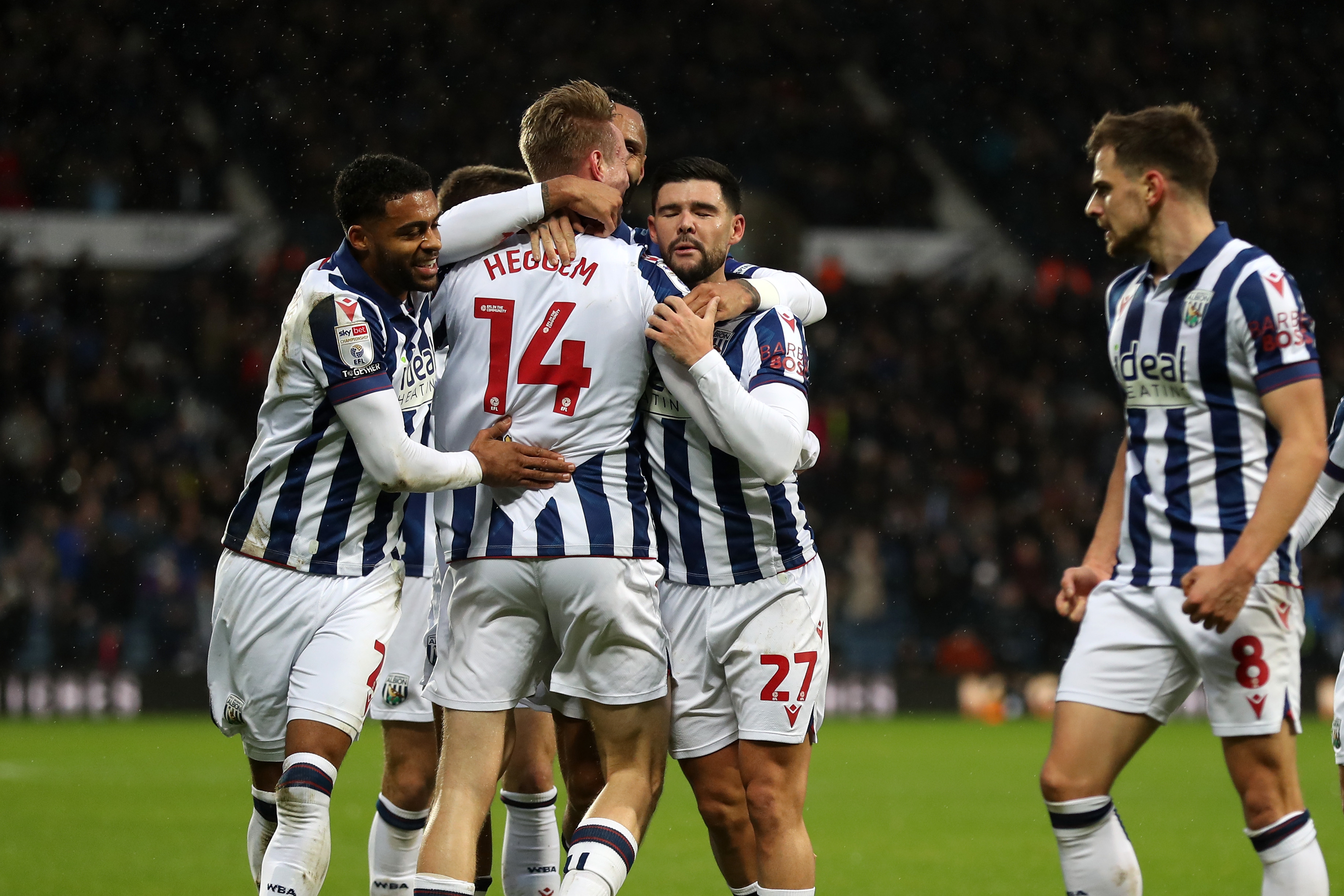 Torbjørn Heggem celebrates scoring a header against Sheffield United with team-mates 