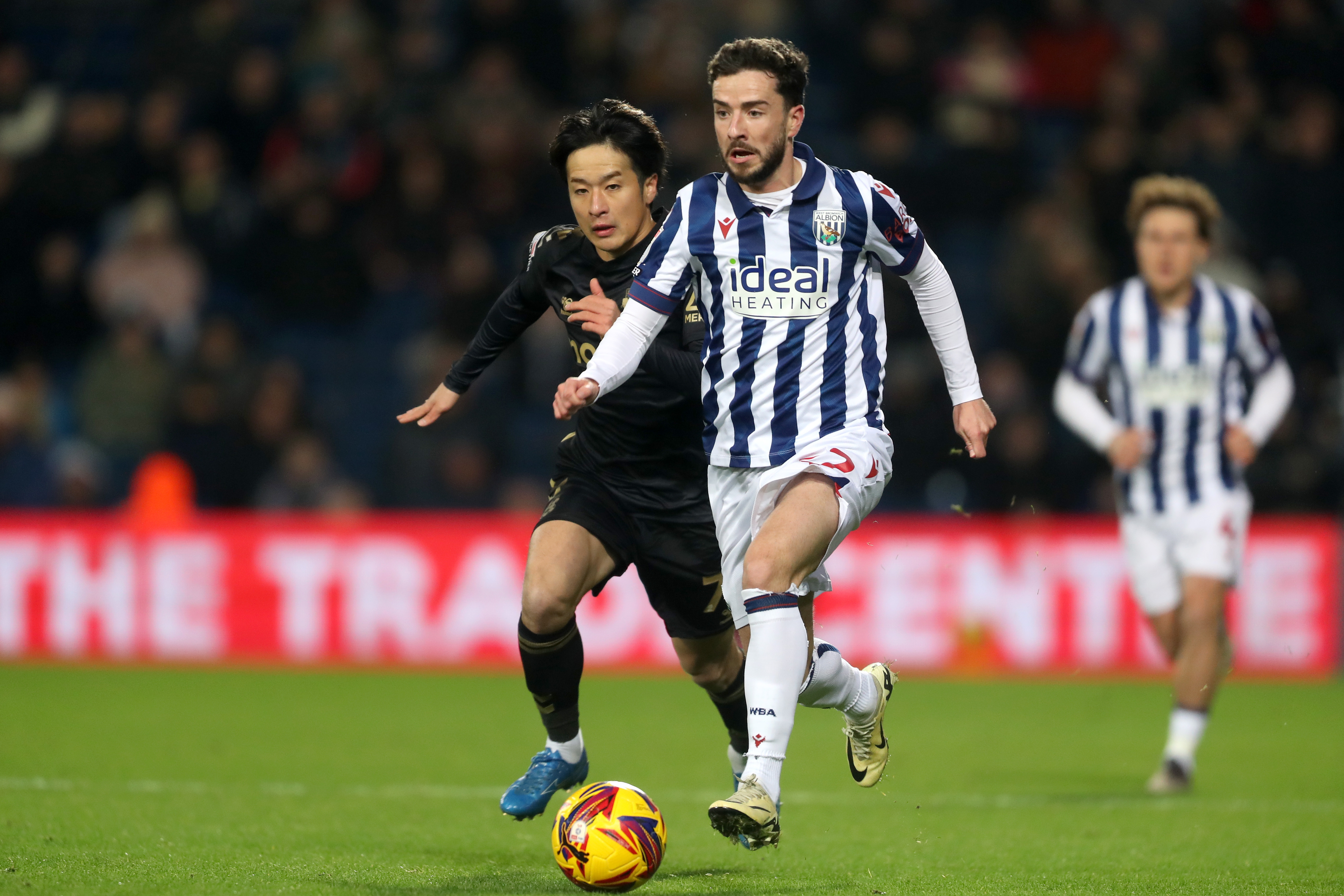 Mikey Johnston running with the ball against Coventry City 