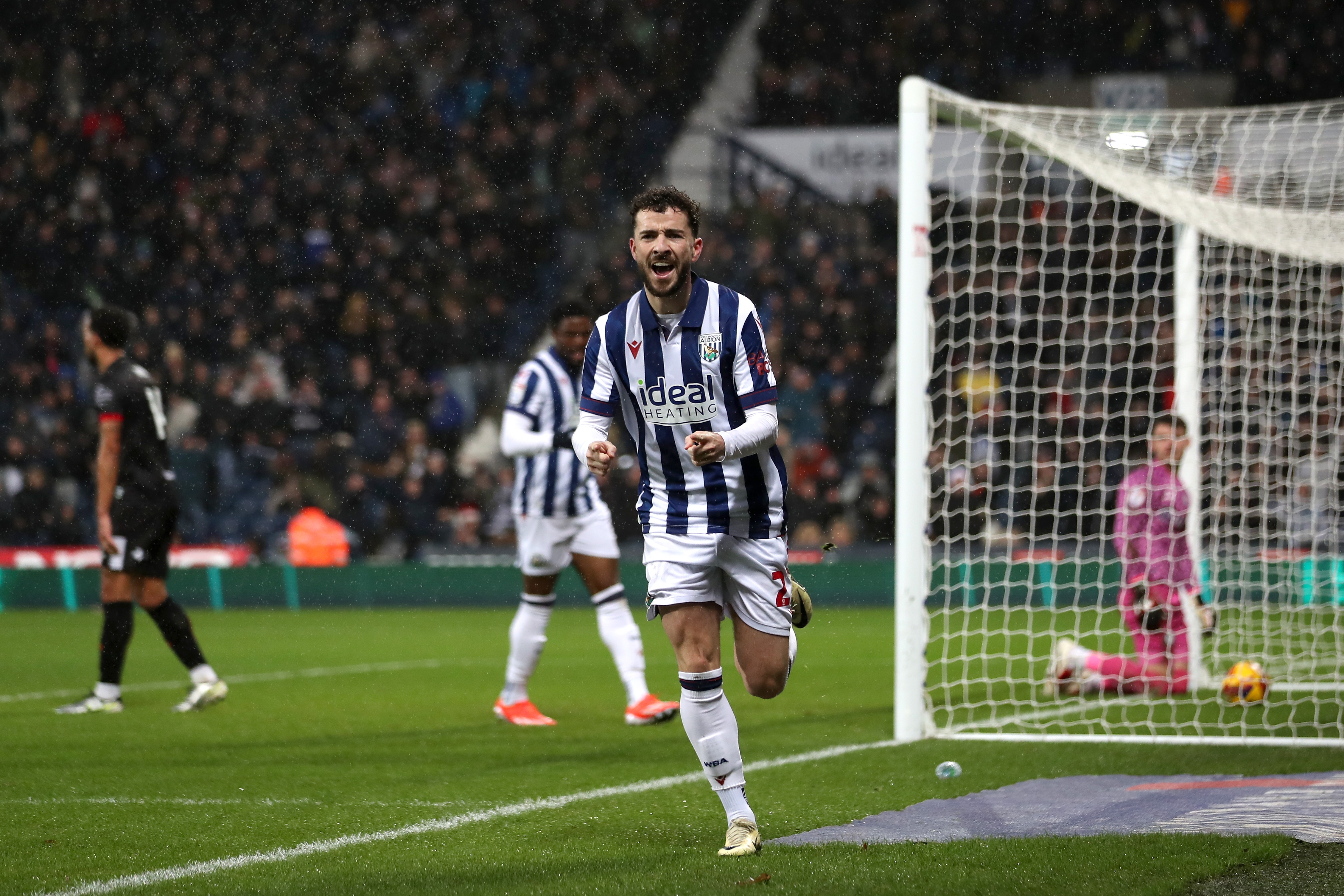 Mikey Johnston celebrates scoring a header against Bristol City 