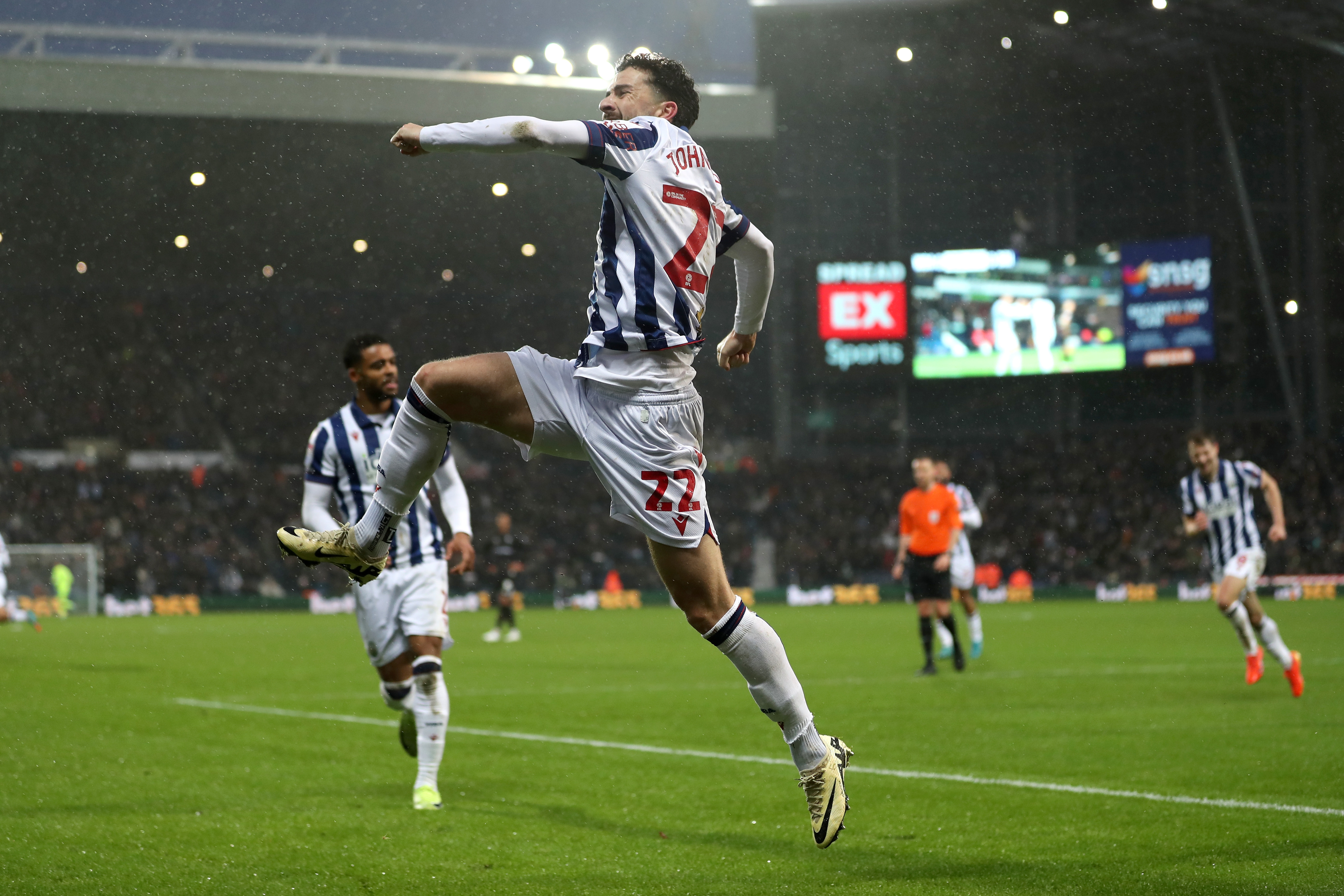 Mikey Johnston celebrates scoring a header against Bristol City 