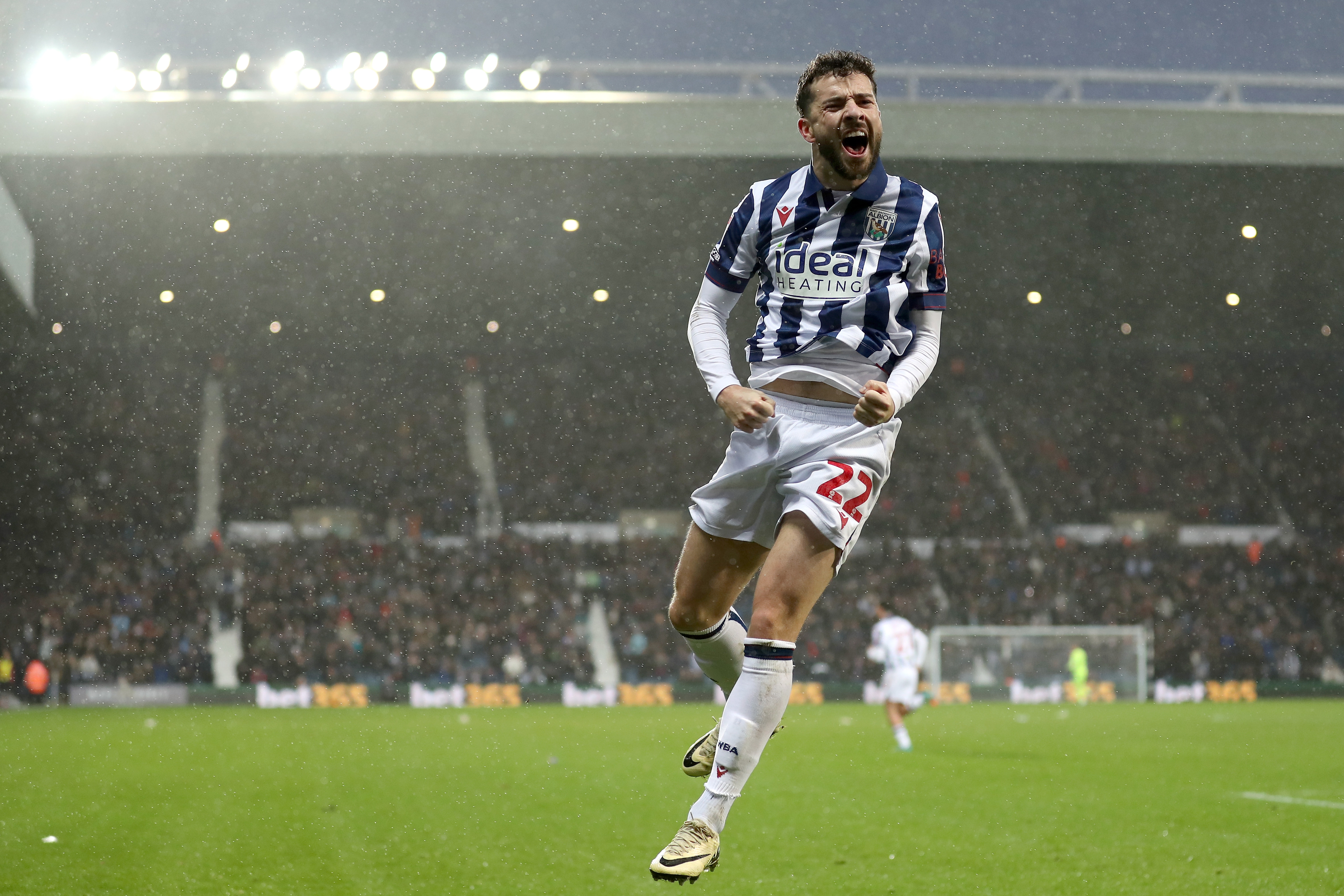 Mikey Johnston celebrates scoring a header against Bristol City 