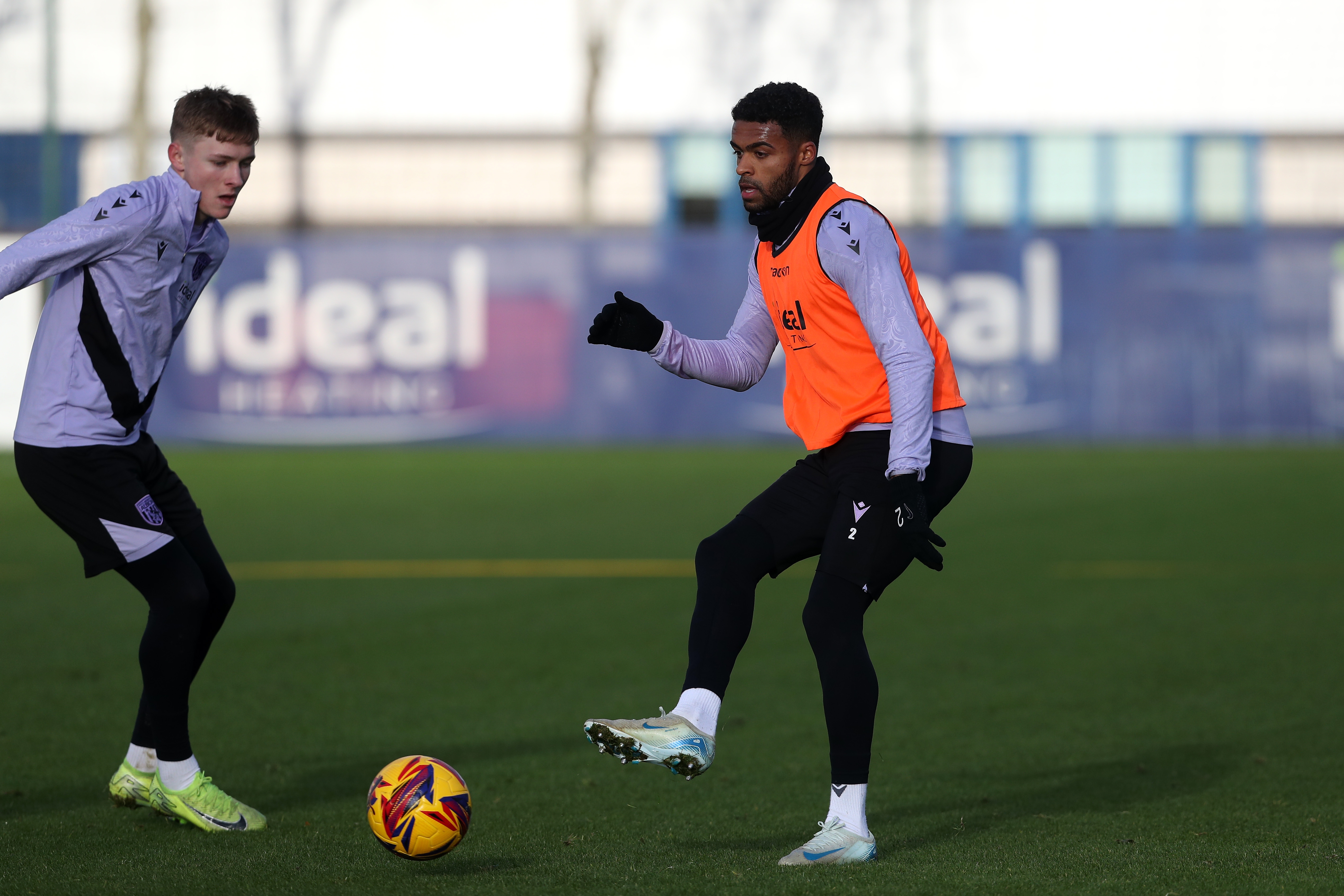 Darnell Furlong passing a ball during training 