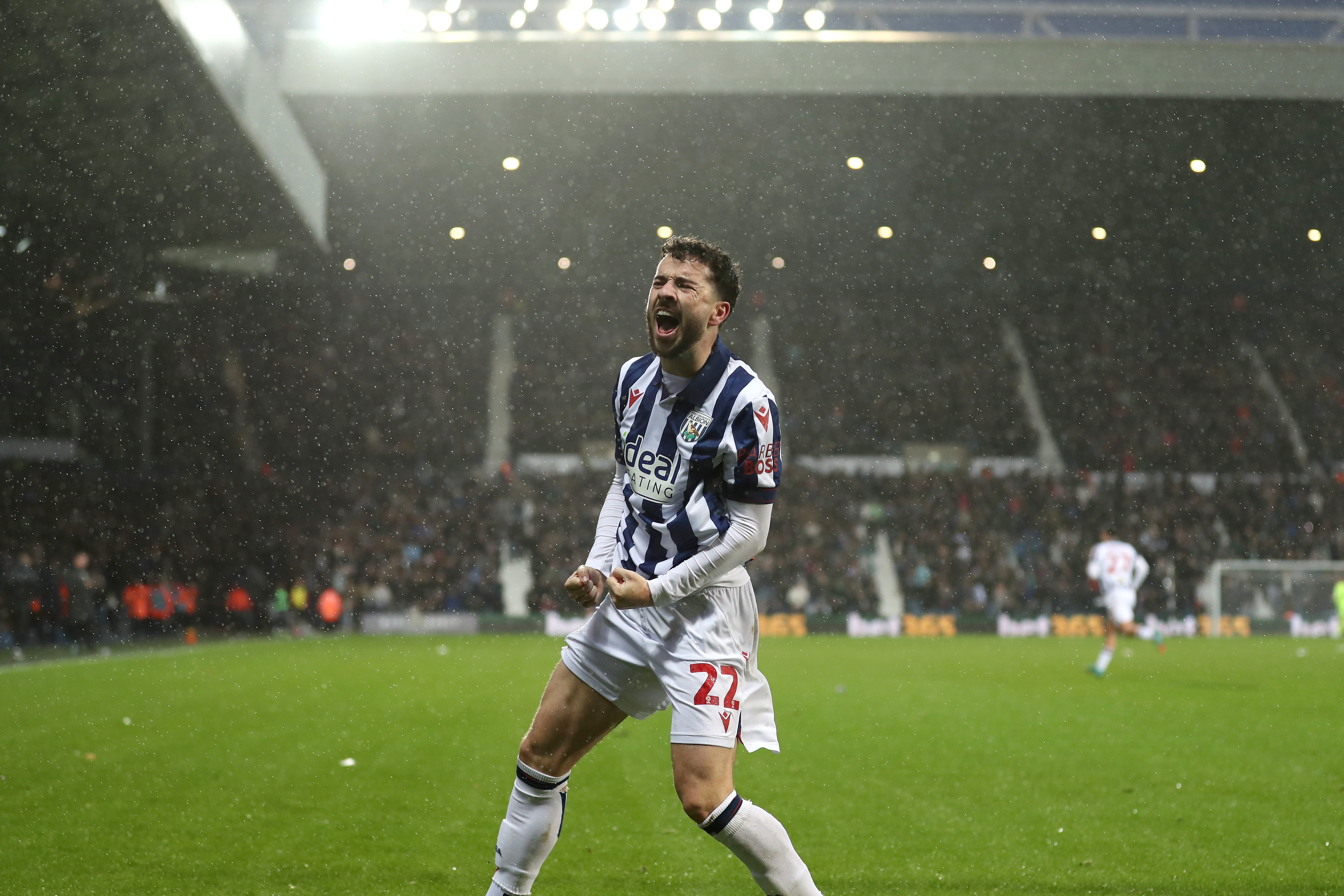 Mikey Johnston celebrates scoring a header against Bristol City 