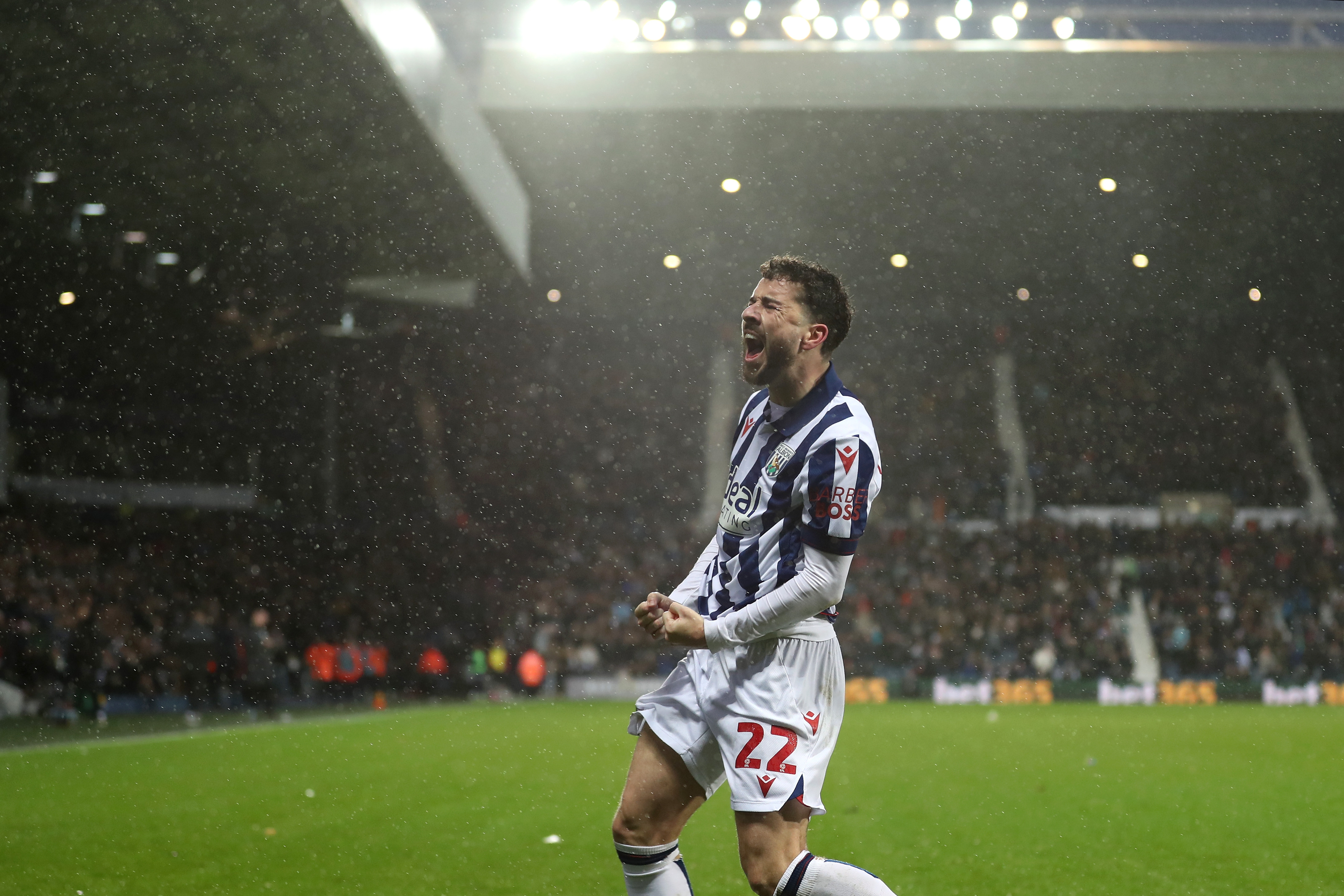 Mikey Johnston celebrates scoring a header against Bristol City 