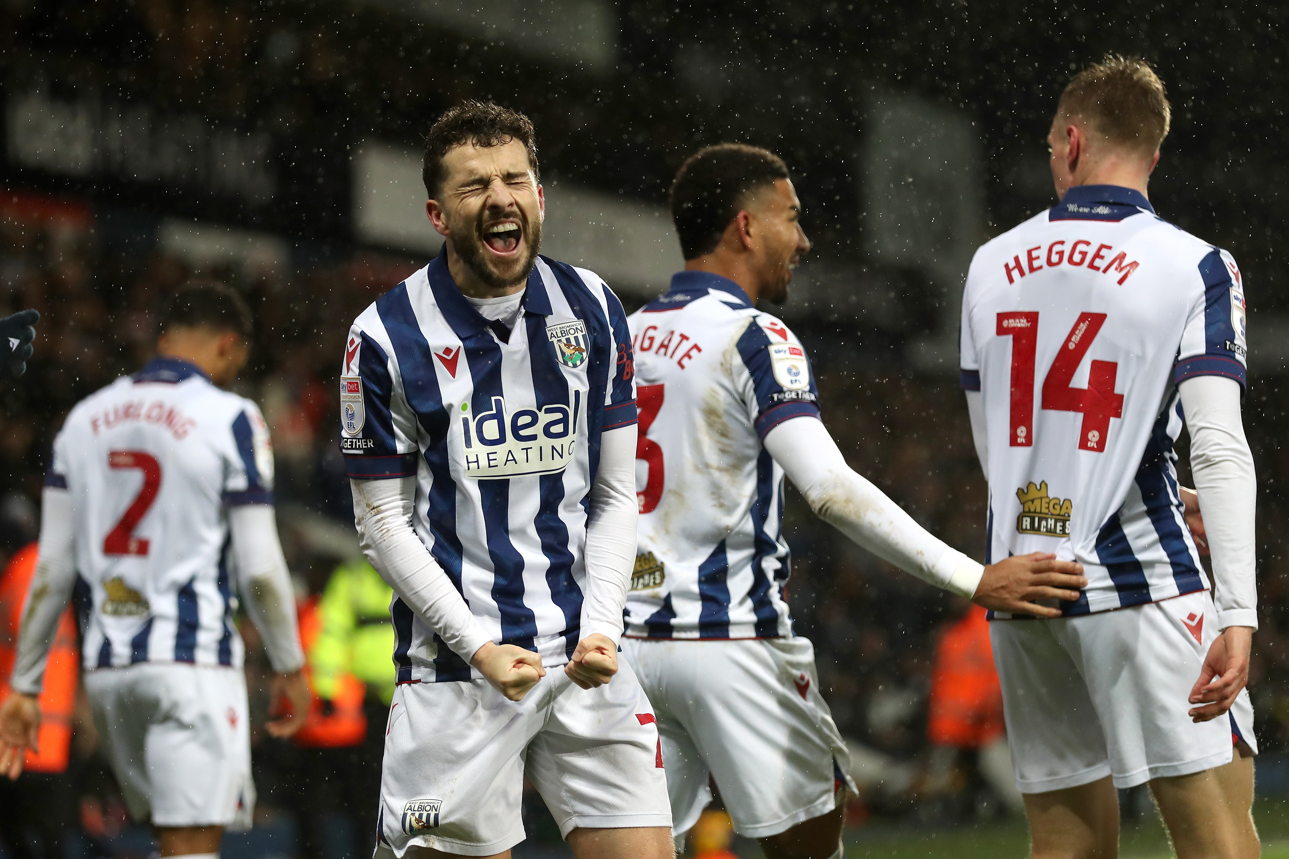 Mikey Johnston celebrates scoring a header against Bristol City 