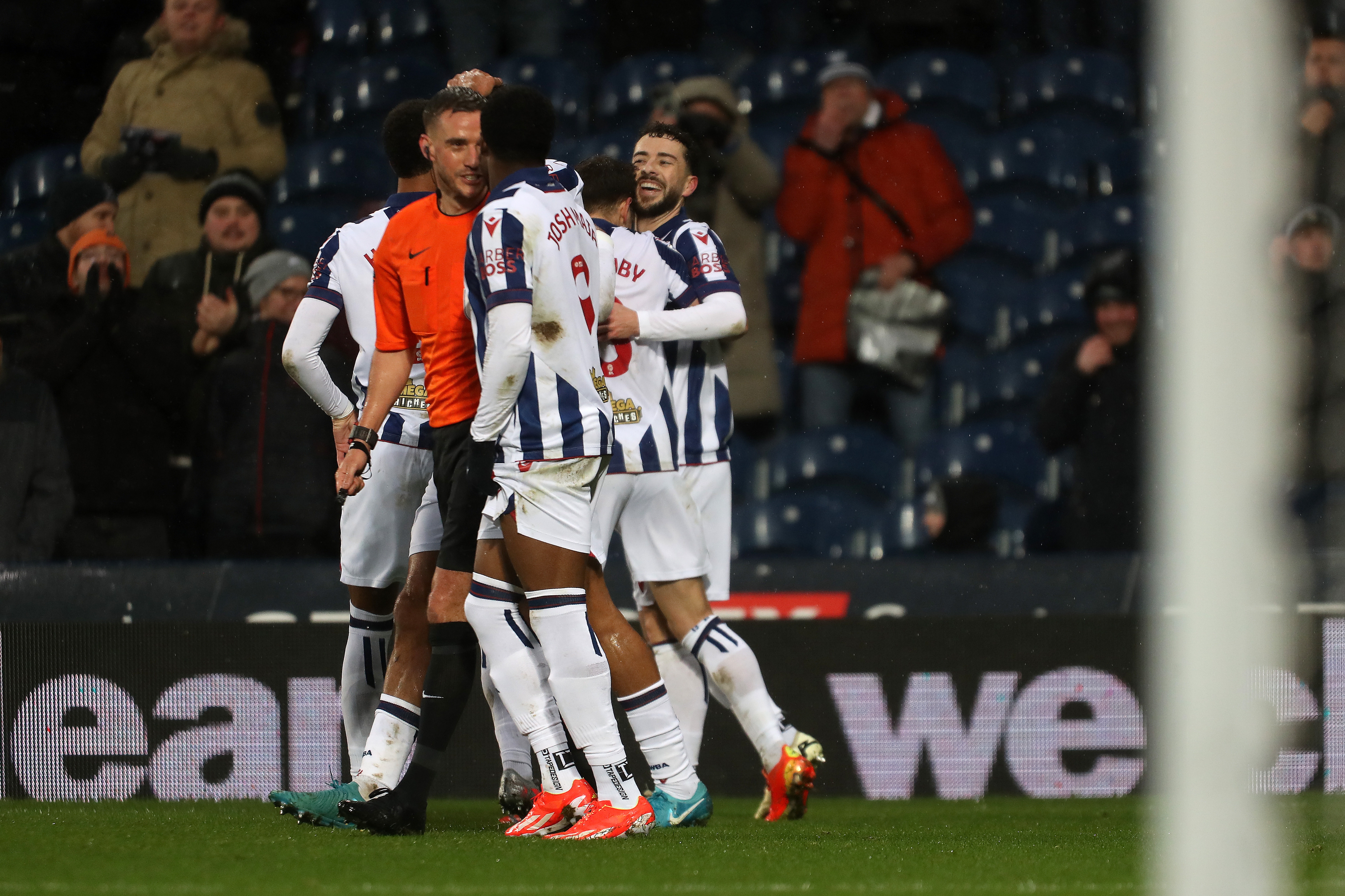 Mikey Johnston celebrates his second goal against Bristol City with team-mates 