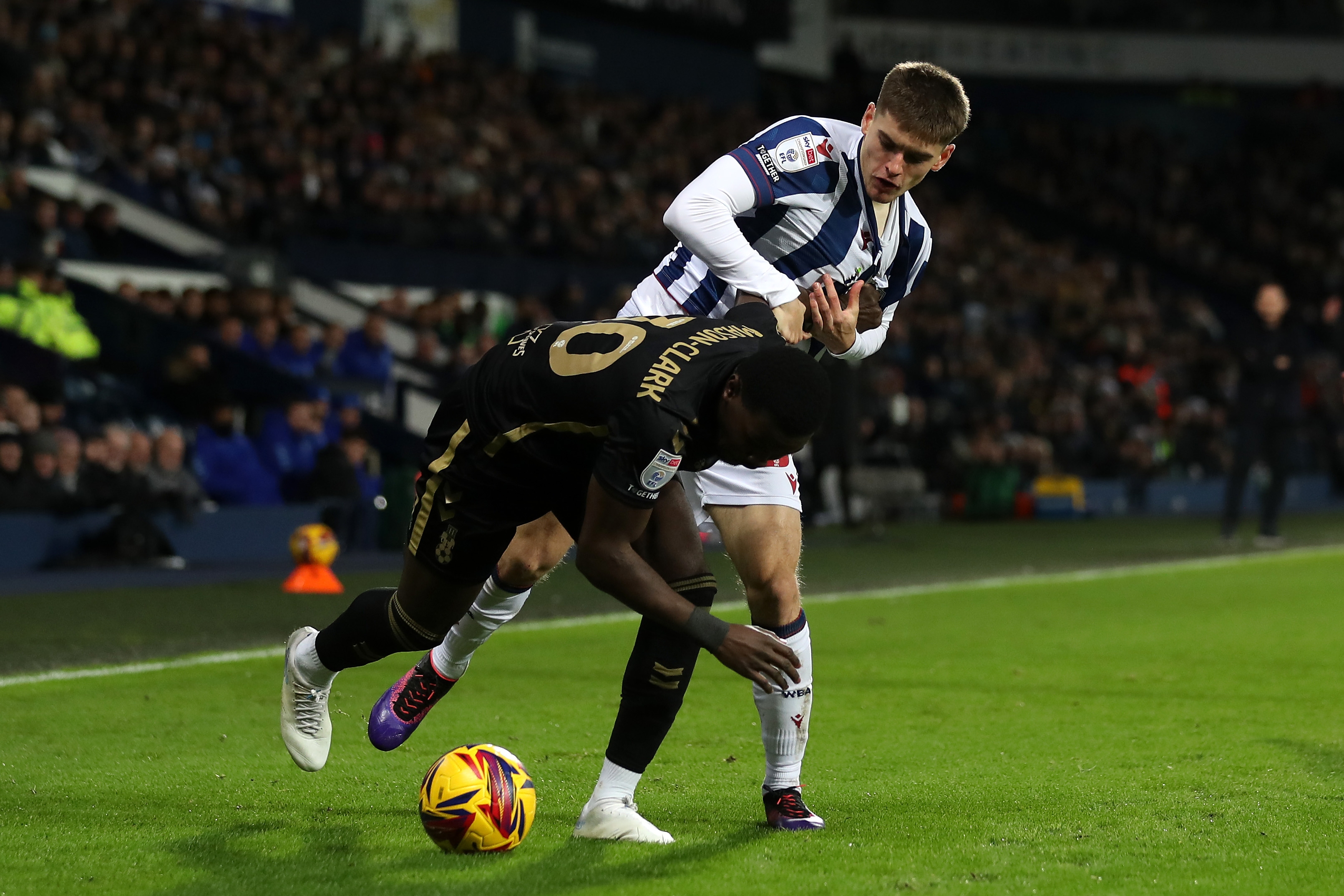 Tom Fellows challenging a Coventry City player 