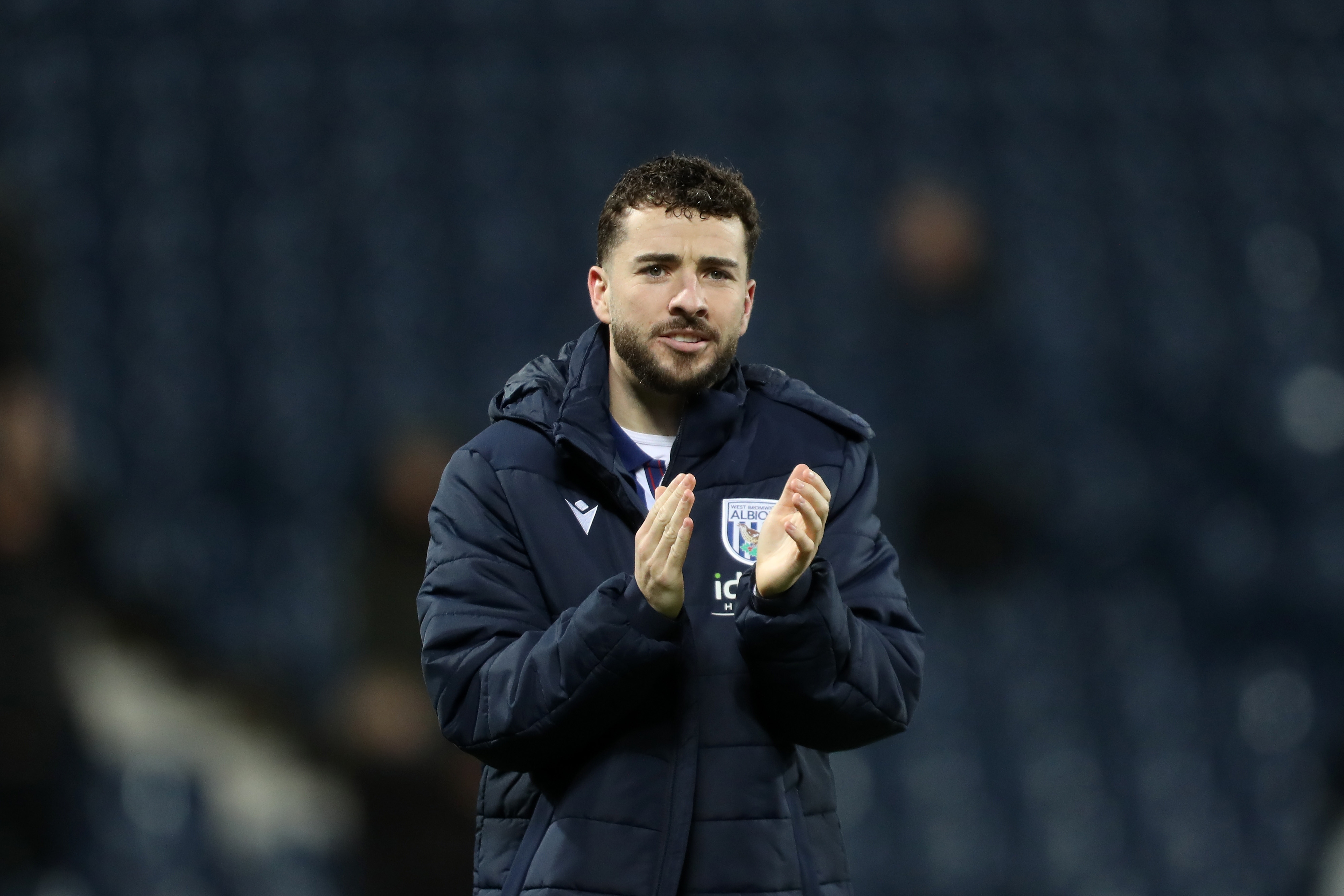 Mikey Johnston applauds Albion fans following the win over Bristol City