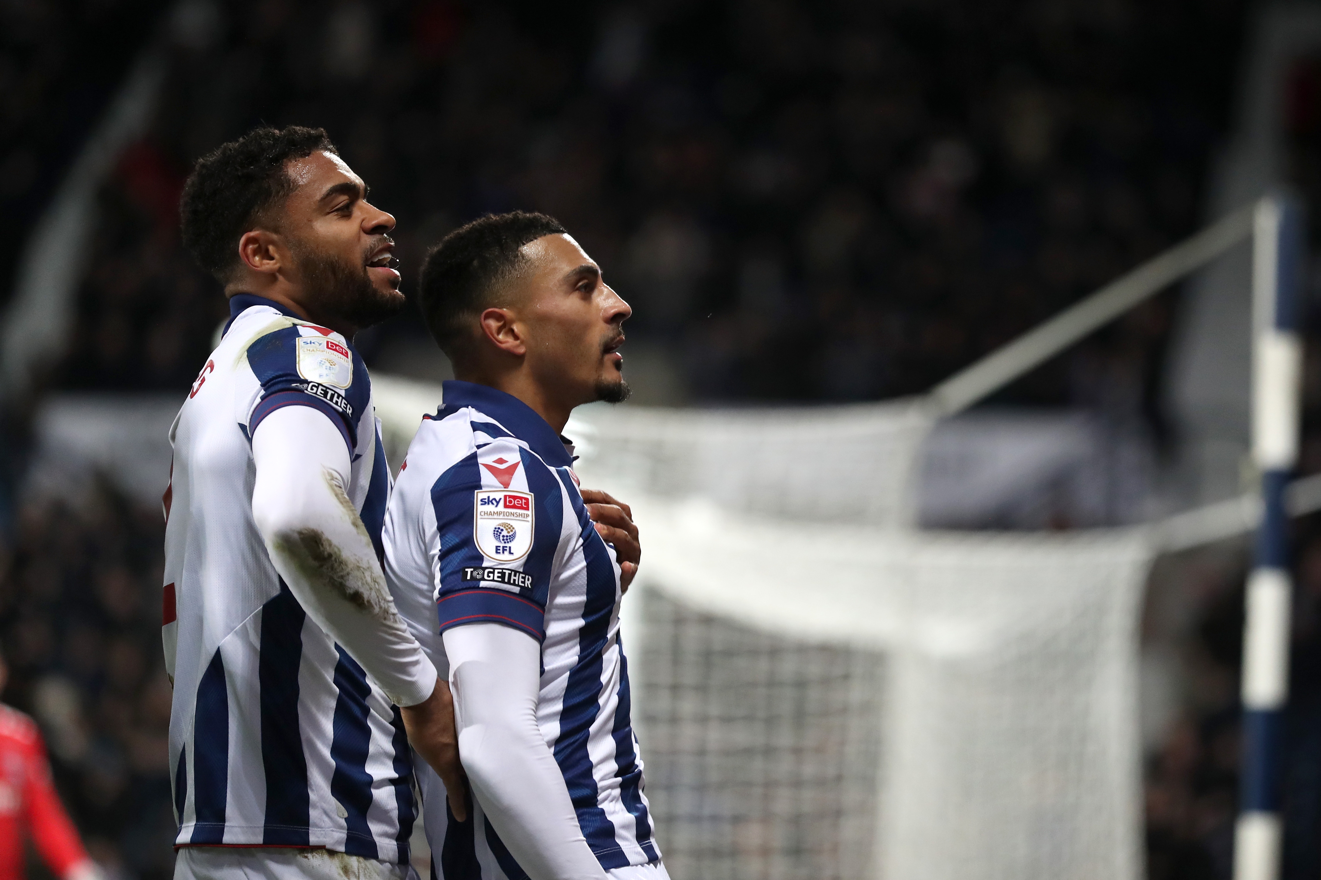 Karlan Grant celebrates scoring against Coventry City with team-mates