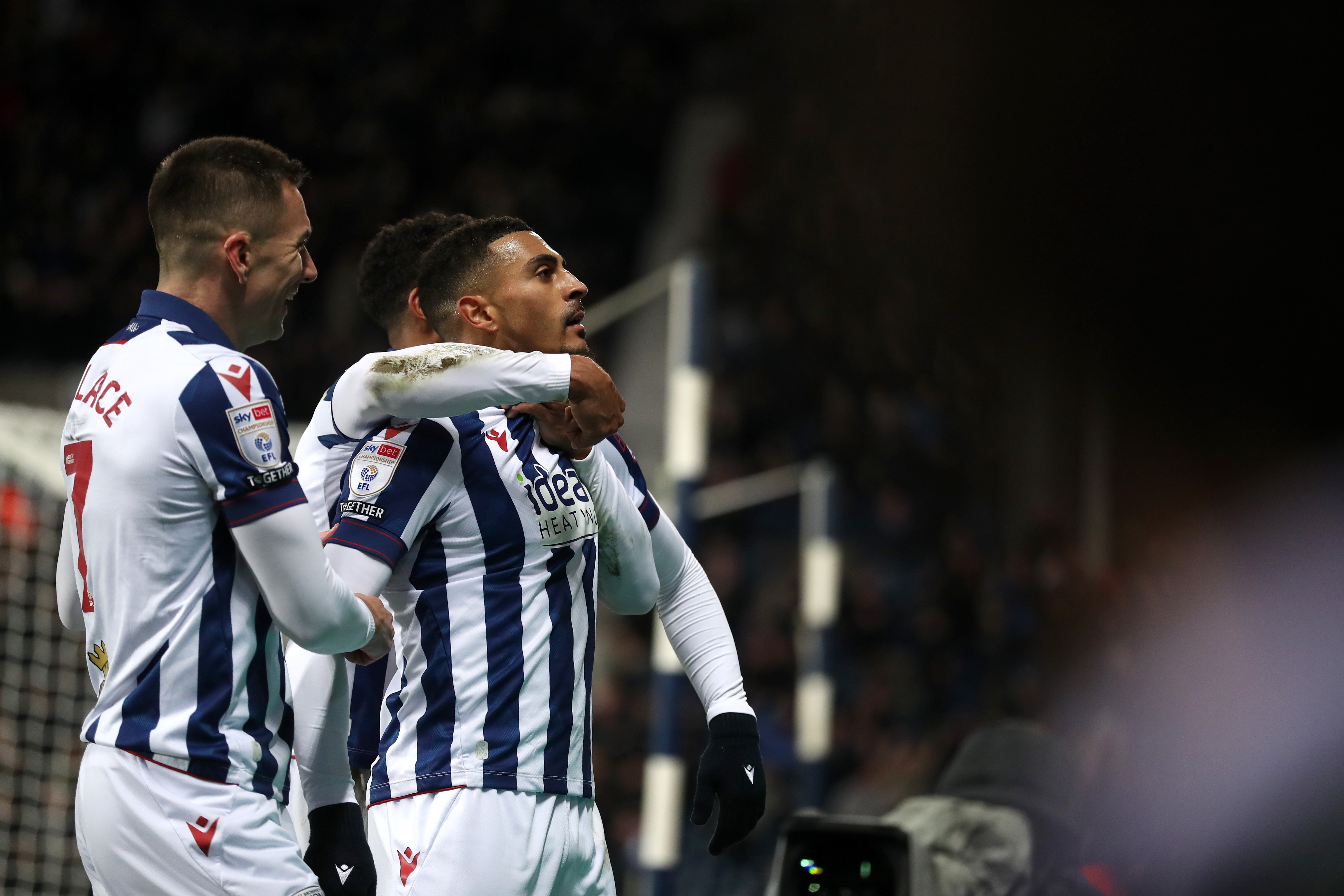 Karlan Grant celebrates scoring against Coventry City with team-mates