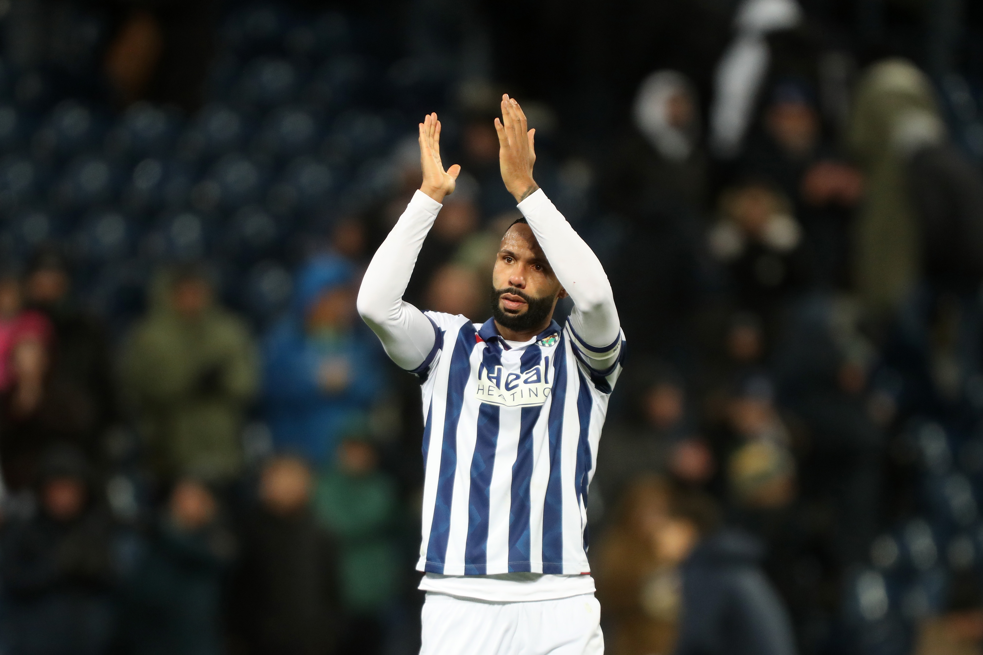 Kyle Bartley applauds Albion fans following the win over Bristol City