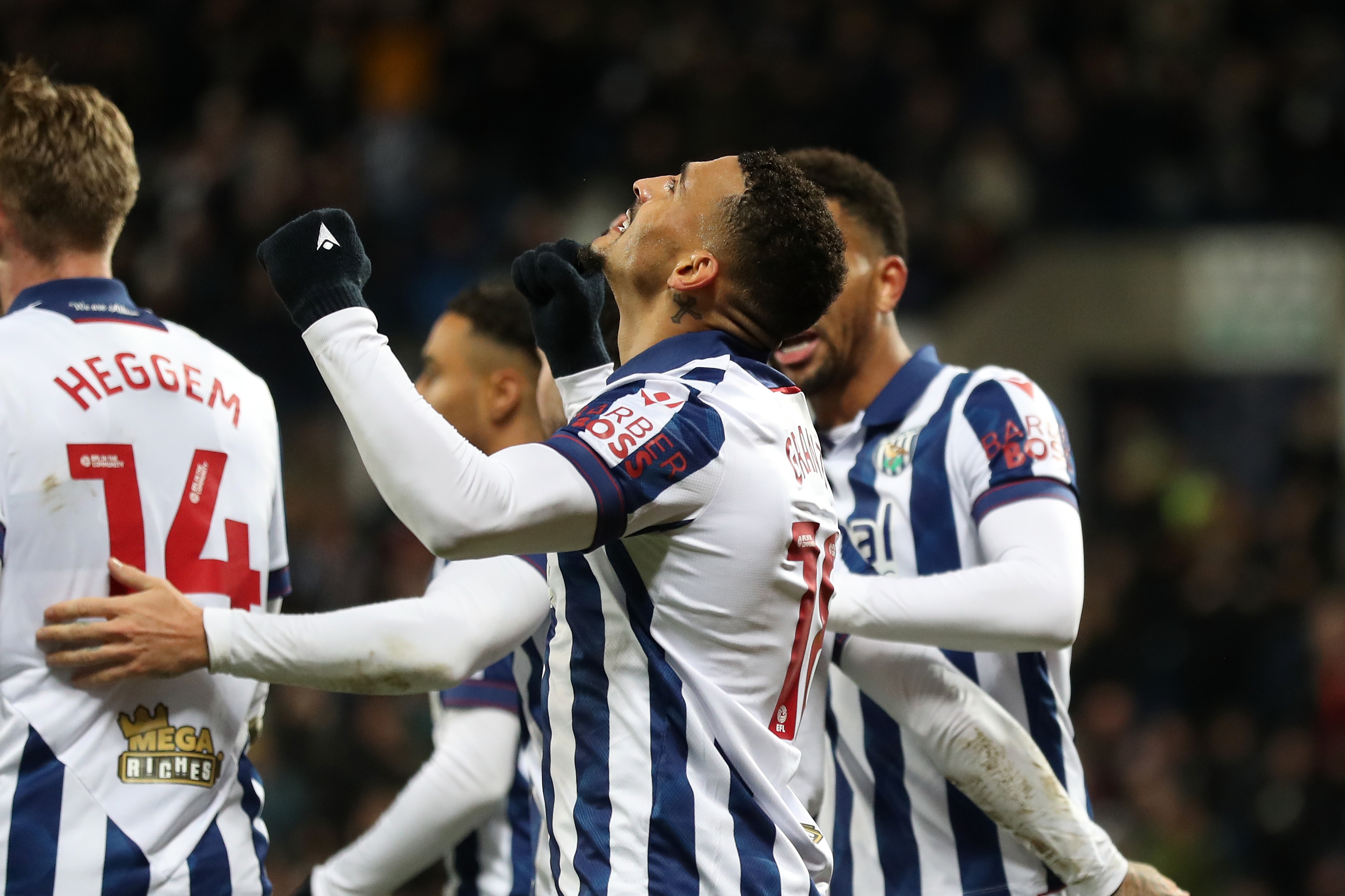 Karlan Grant celebrates scoring against Coventry City with team-mates