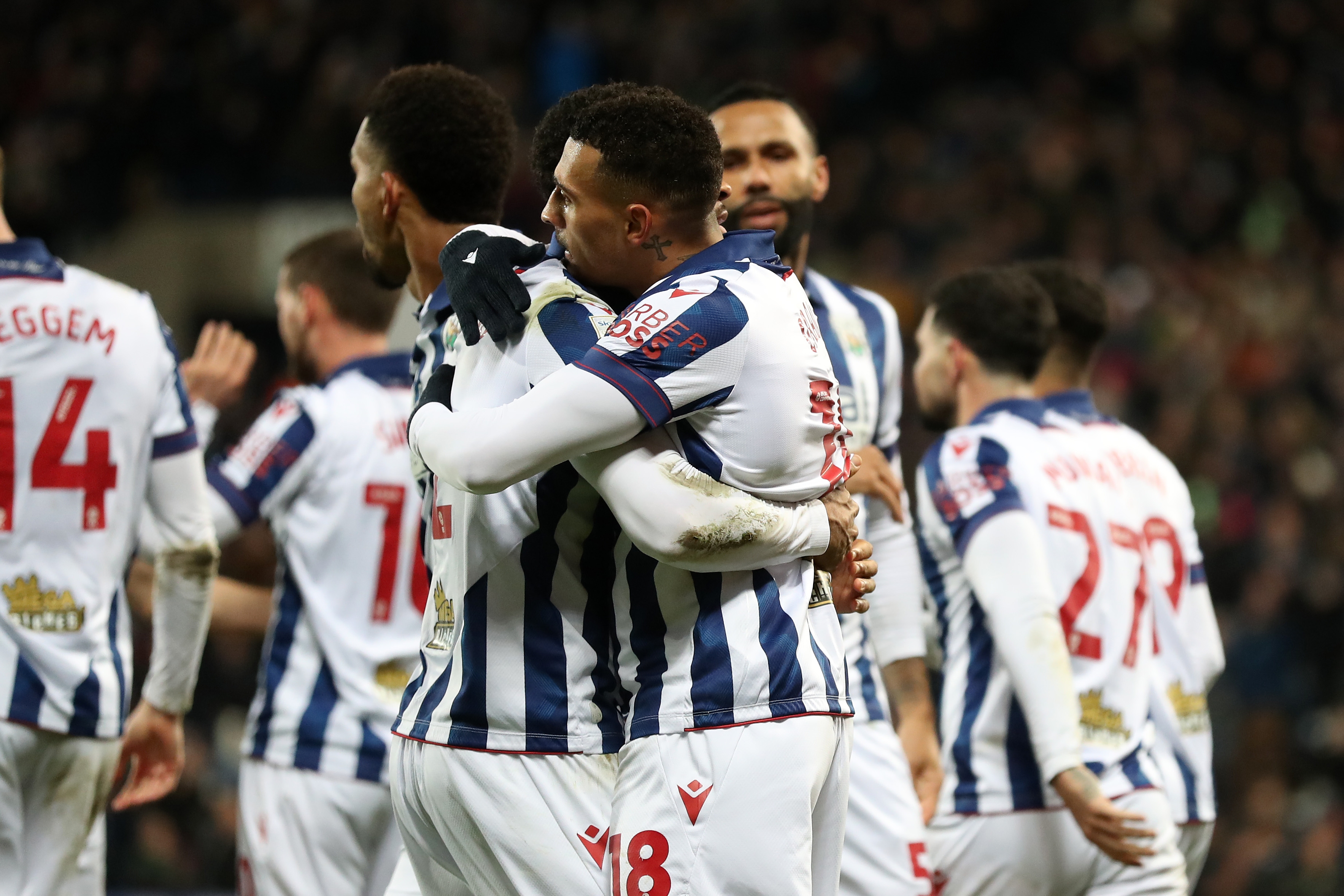 Karlan Grant celebrates scoring against Coventry City with team-mates