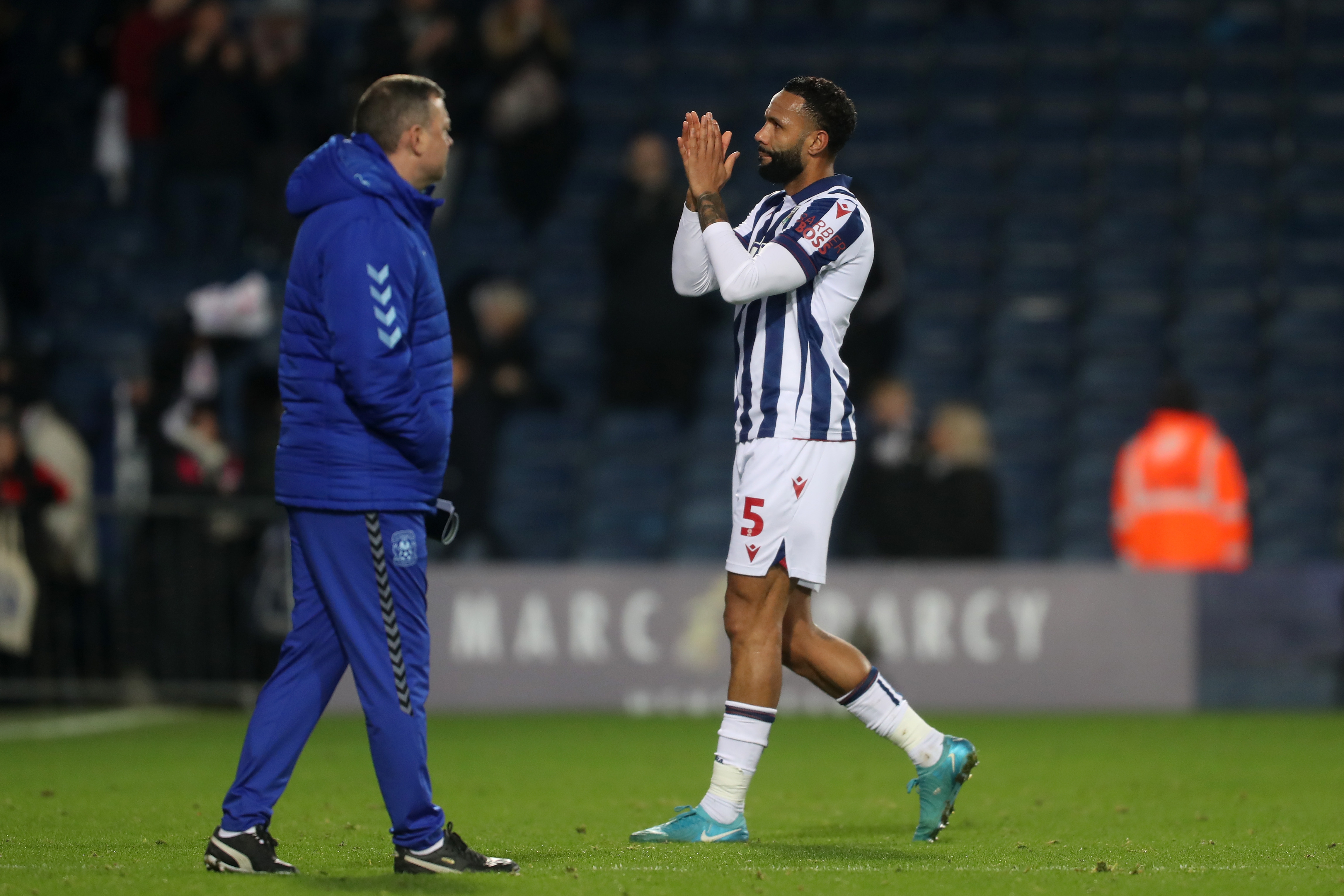 Kyle Bartley applauds supporters after Albion's win against Coventry City 