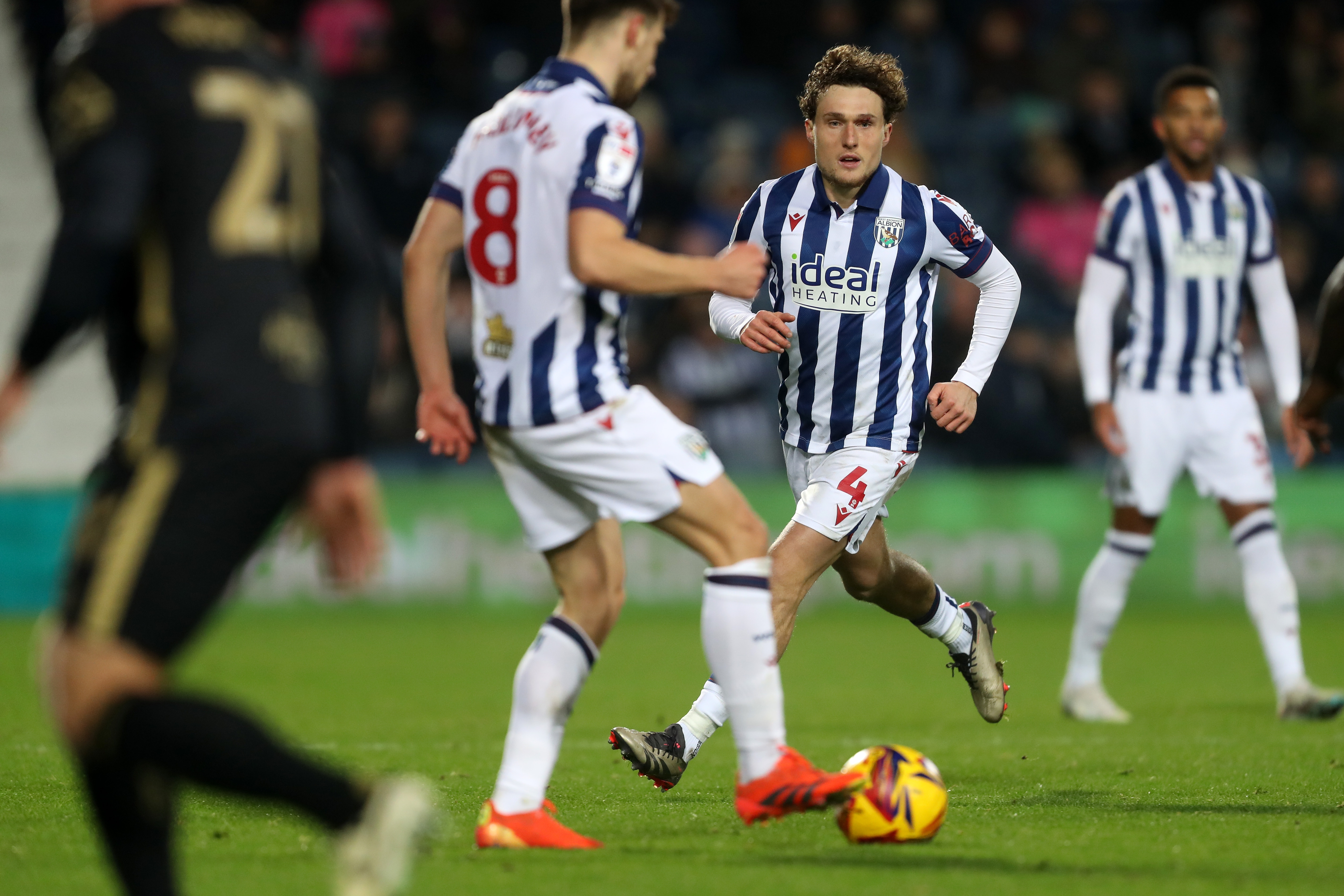 Jayson Molumby on the ball against Coventry City with Callum Styles watching 