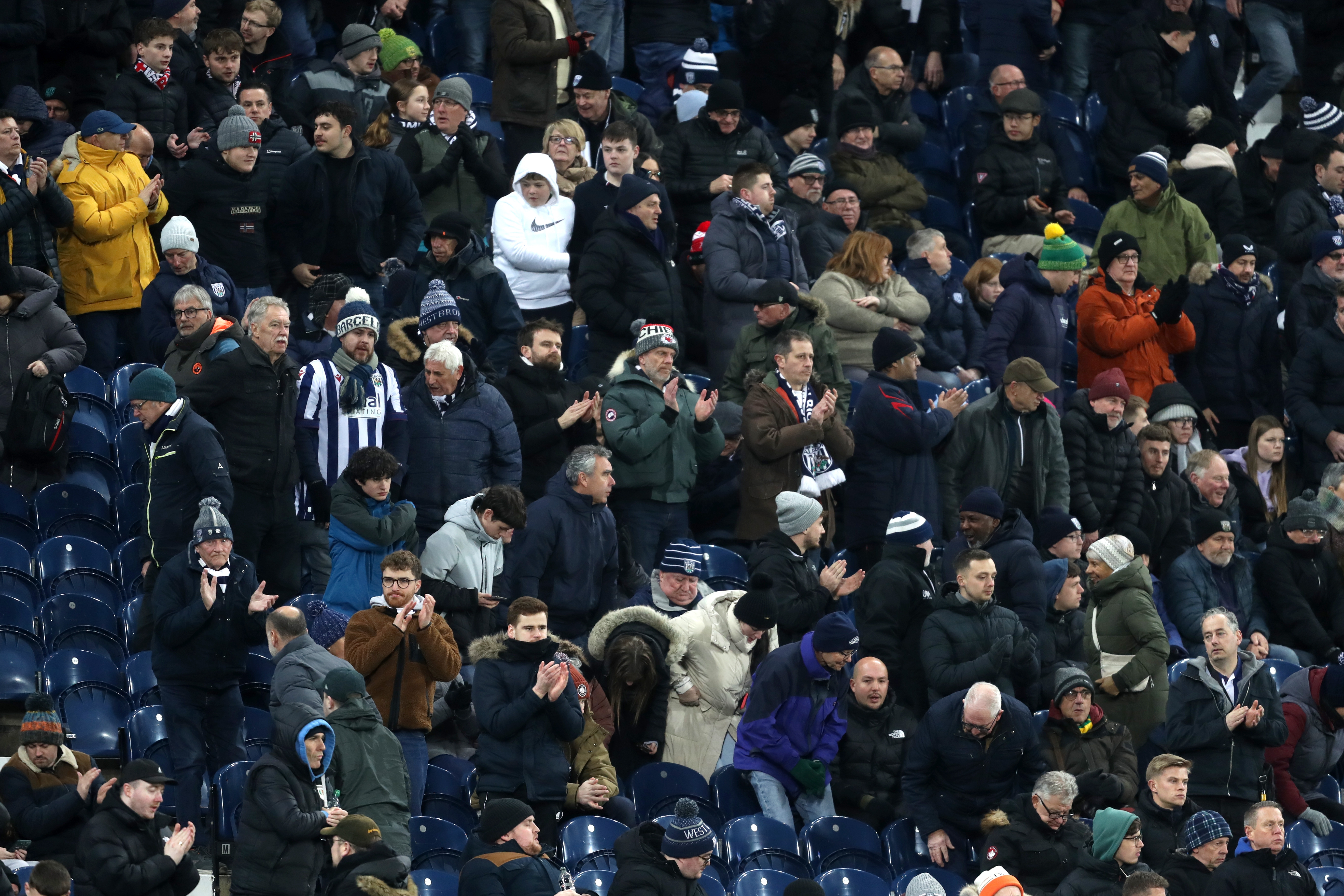 A general view of Albion fans watching the Coventry City game from the stand 