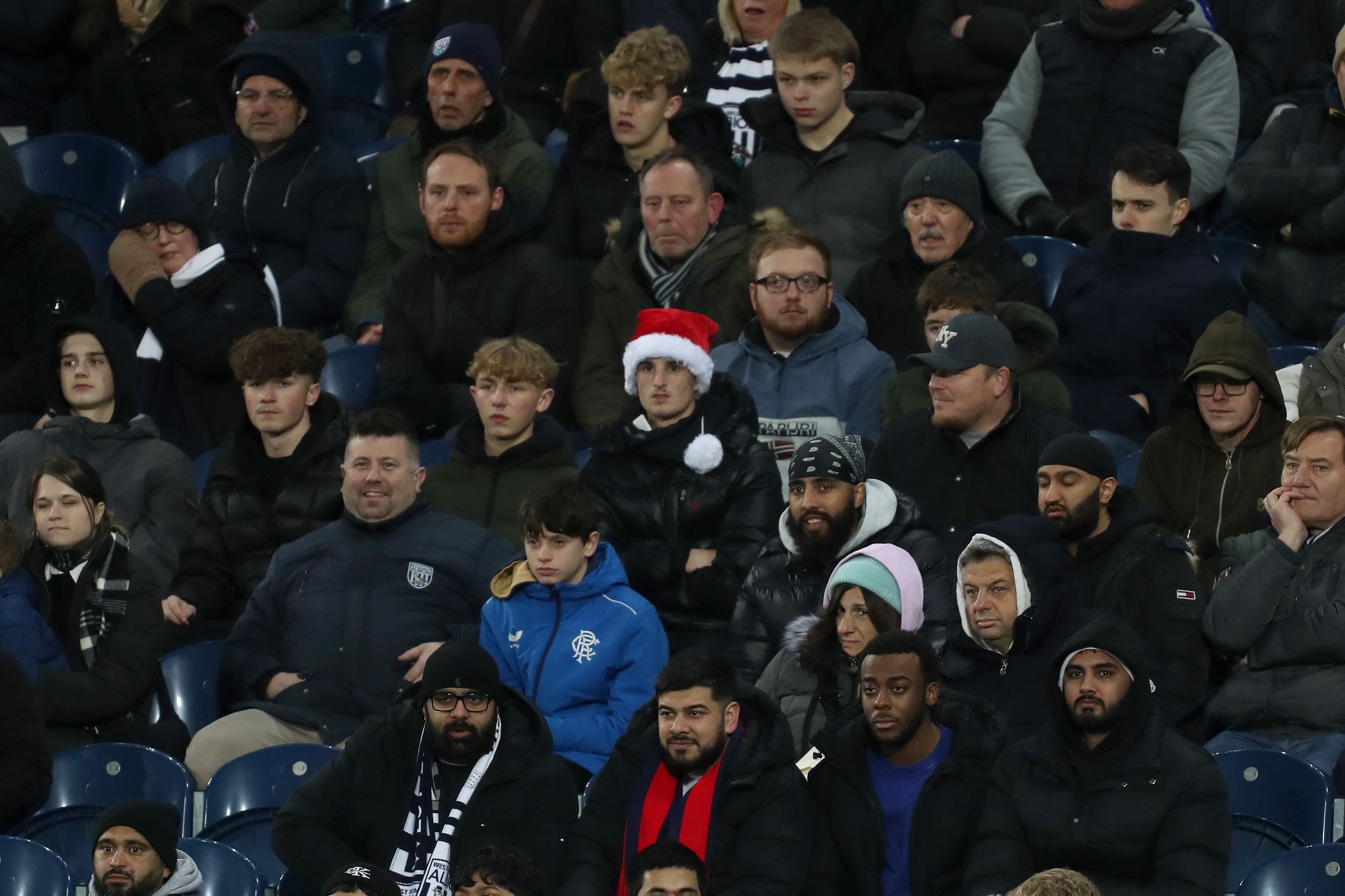 A general view of Albion fans watching the Coventry City game from the stand 