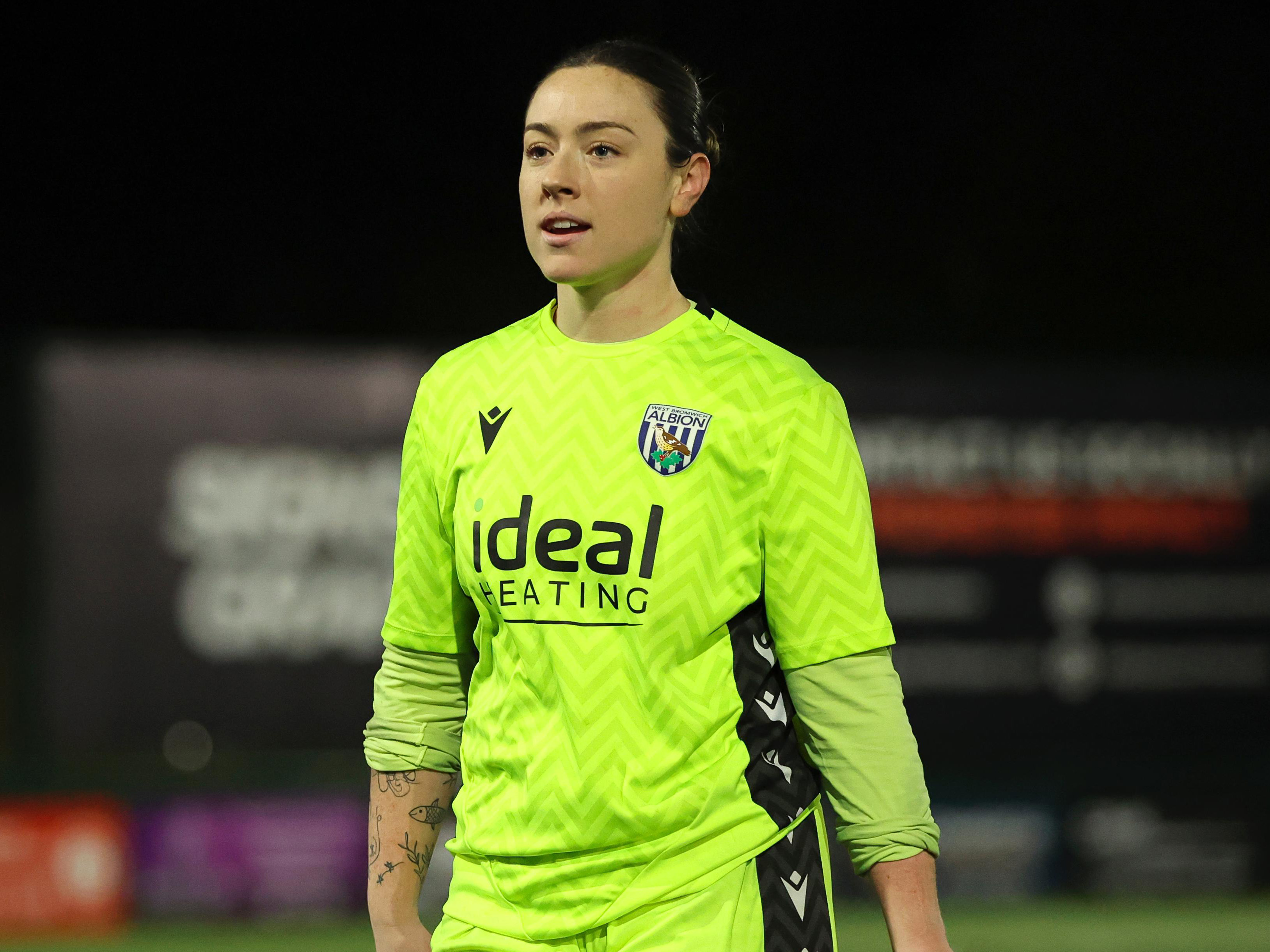 Anna Miller in the yellow goalkeeper shirt 