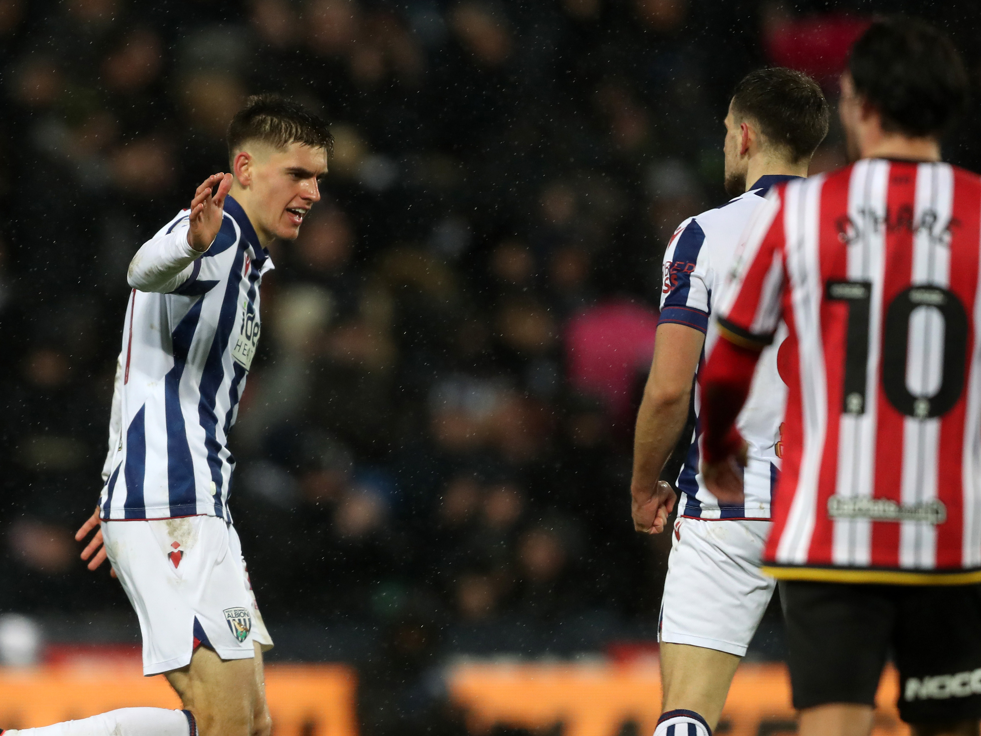 An image of Tom Fellows celebrating his goal against Sheffield United