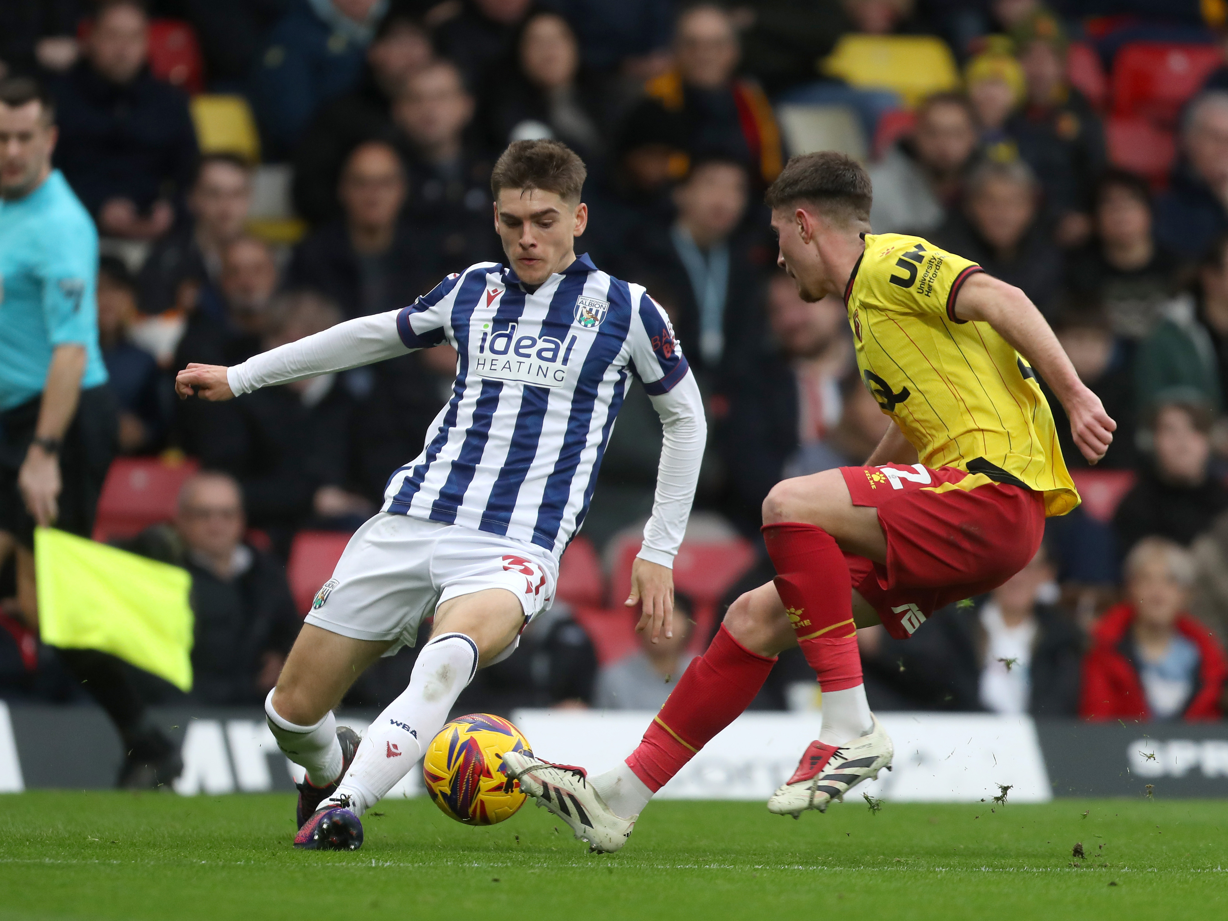 An image of Tom Fellows passing the ball