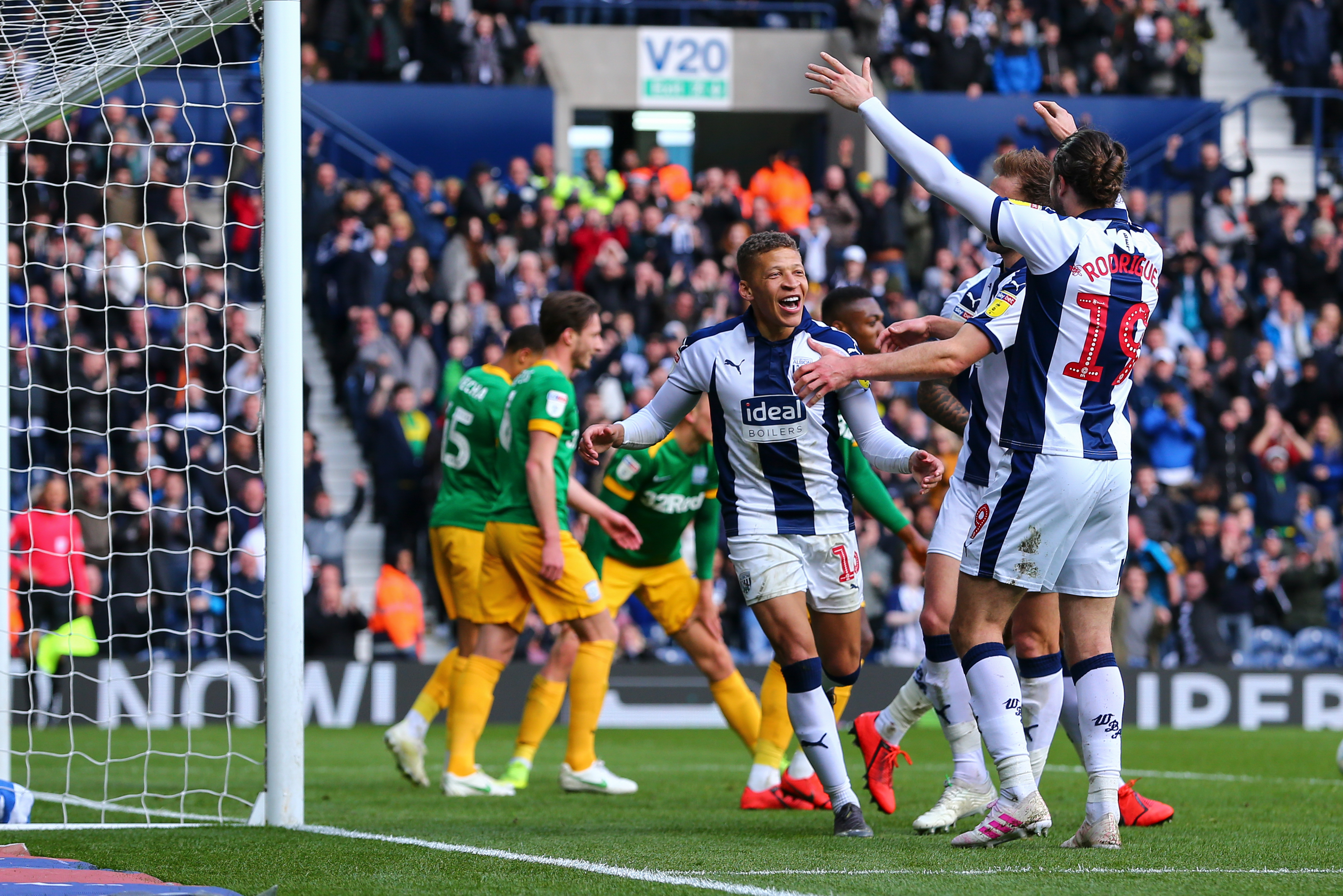 Dwight Gayle celebrates scoring against Preston at The Hawthorns in April 2019