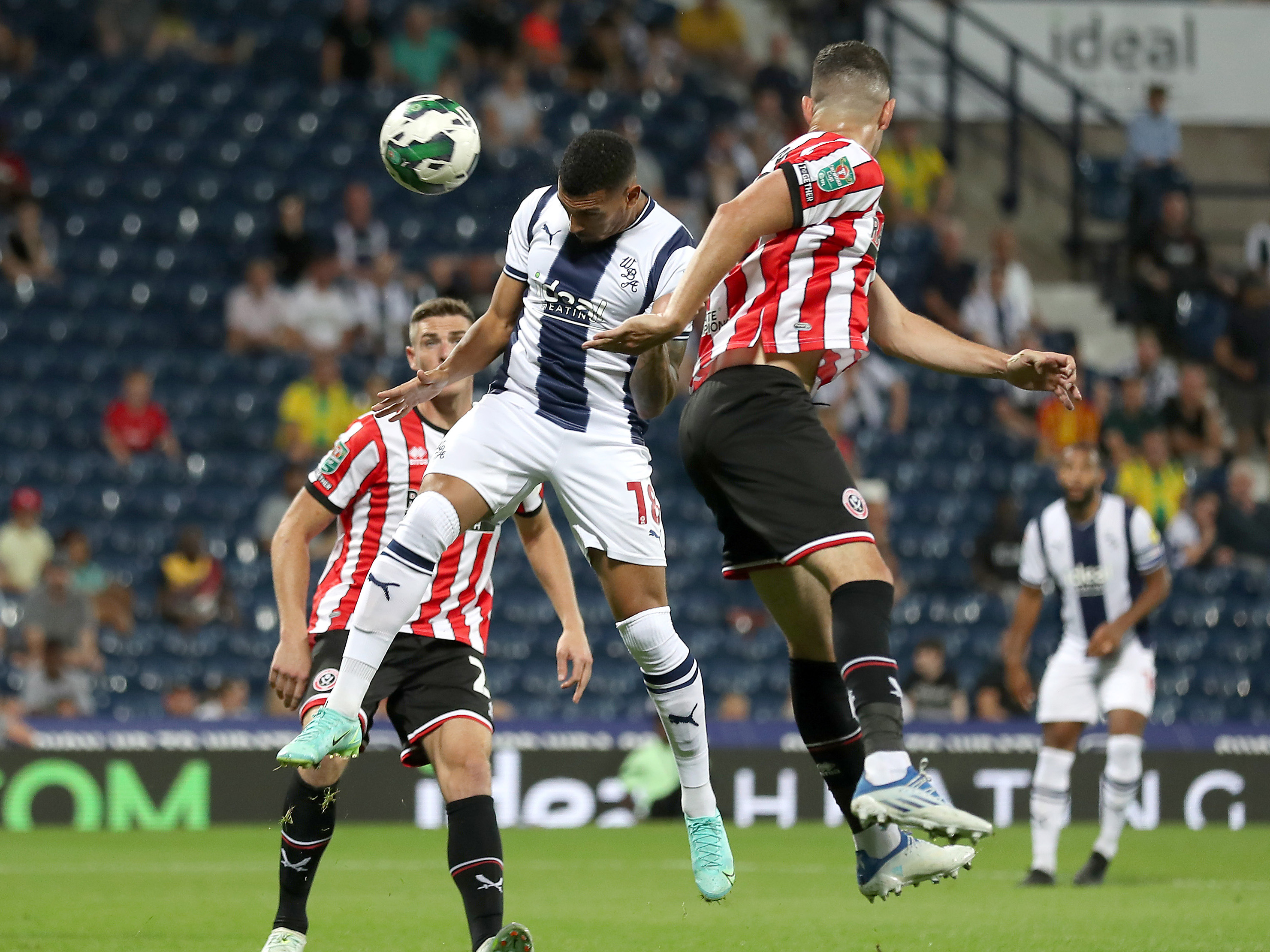 Karlan Grant scores a header against Sheffield United in August 2022