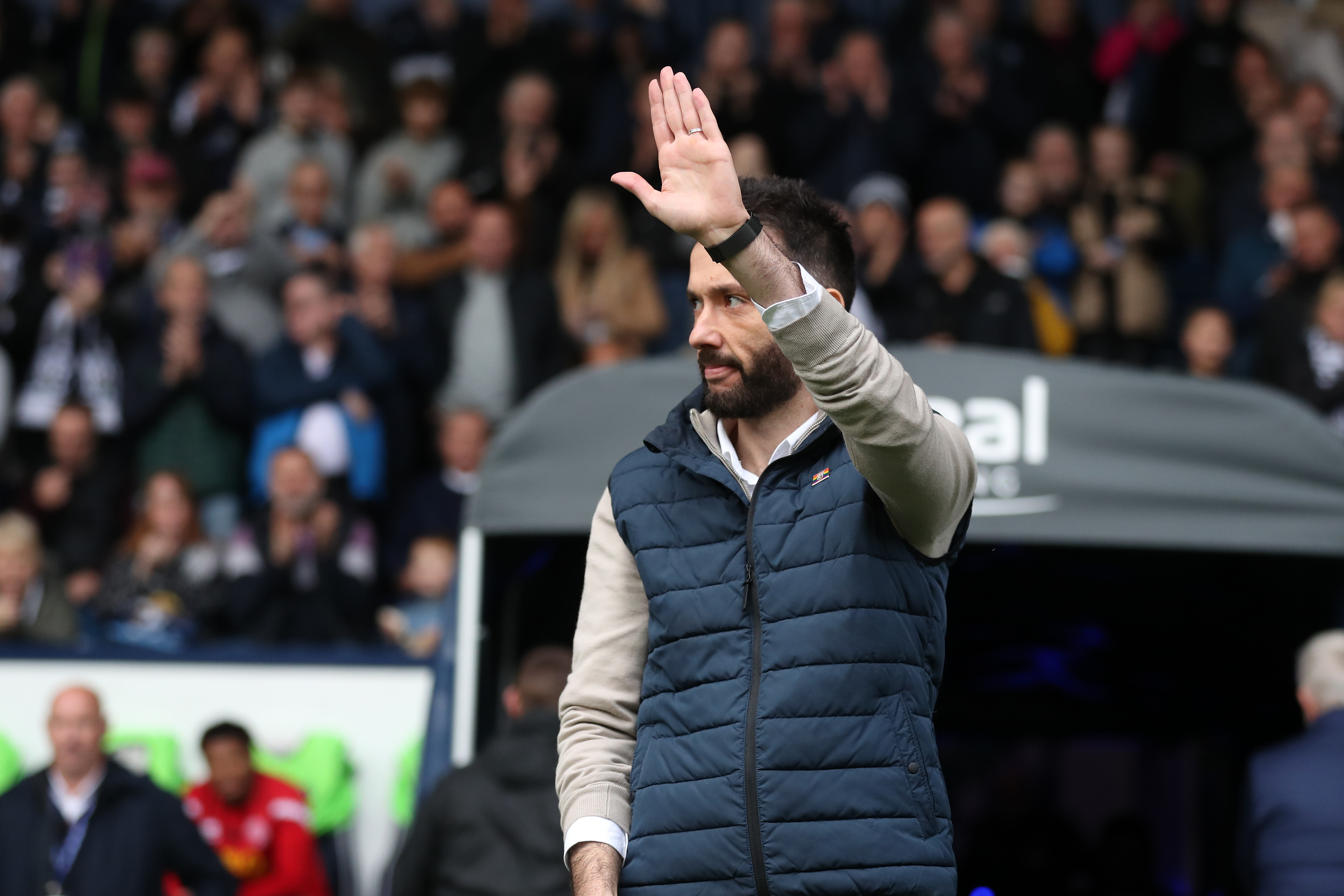 Carlos Corberán waving to Albion fans before his first game as boss against Sheffield United in October 2022