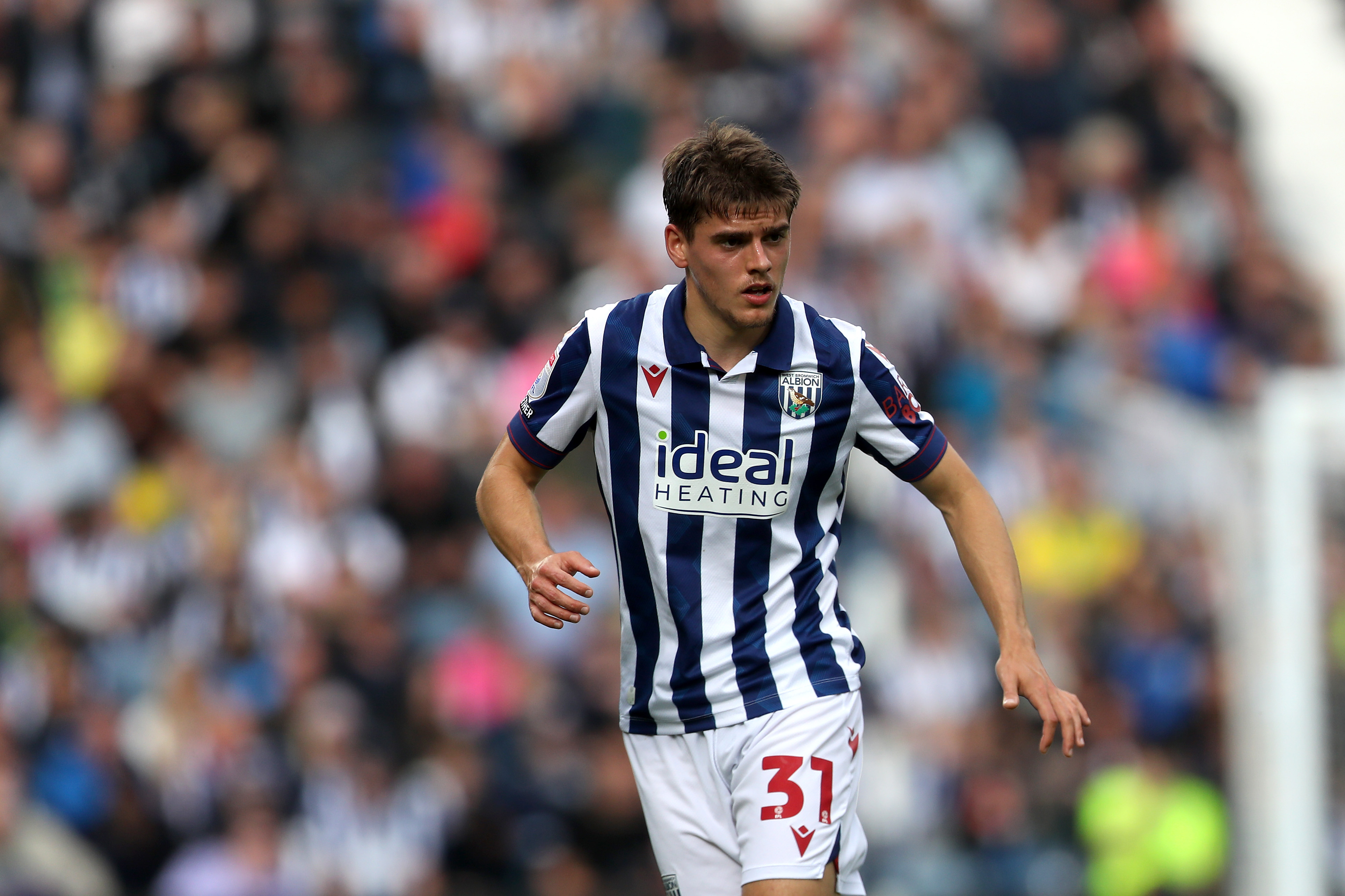 Tom Fellows in action at The Hawthorns in the home shirt