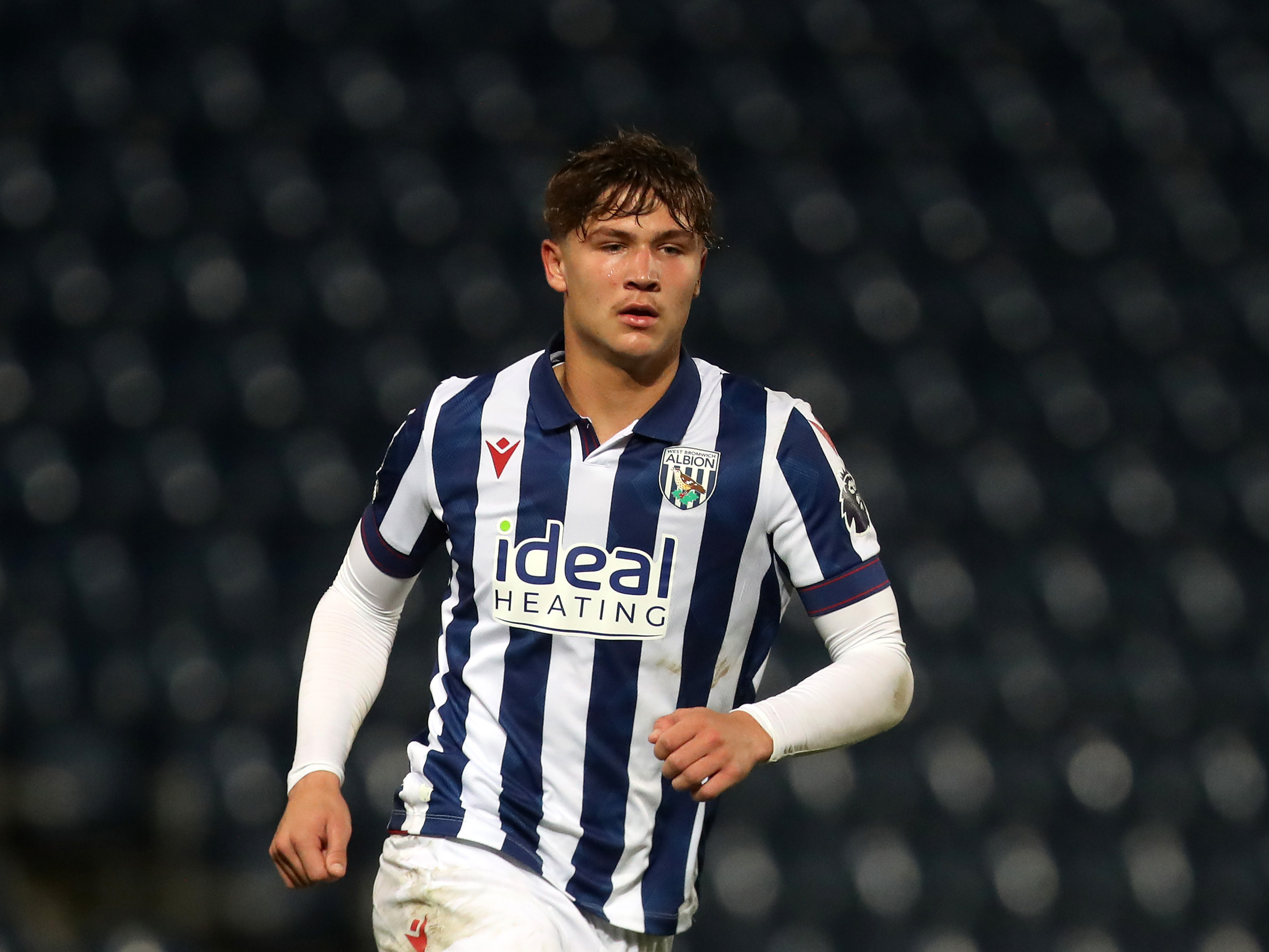 Cole Deeming in action for Albion's PL2 team at The Hawthorns in the home kit 