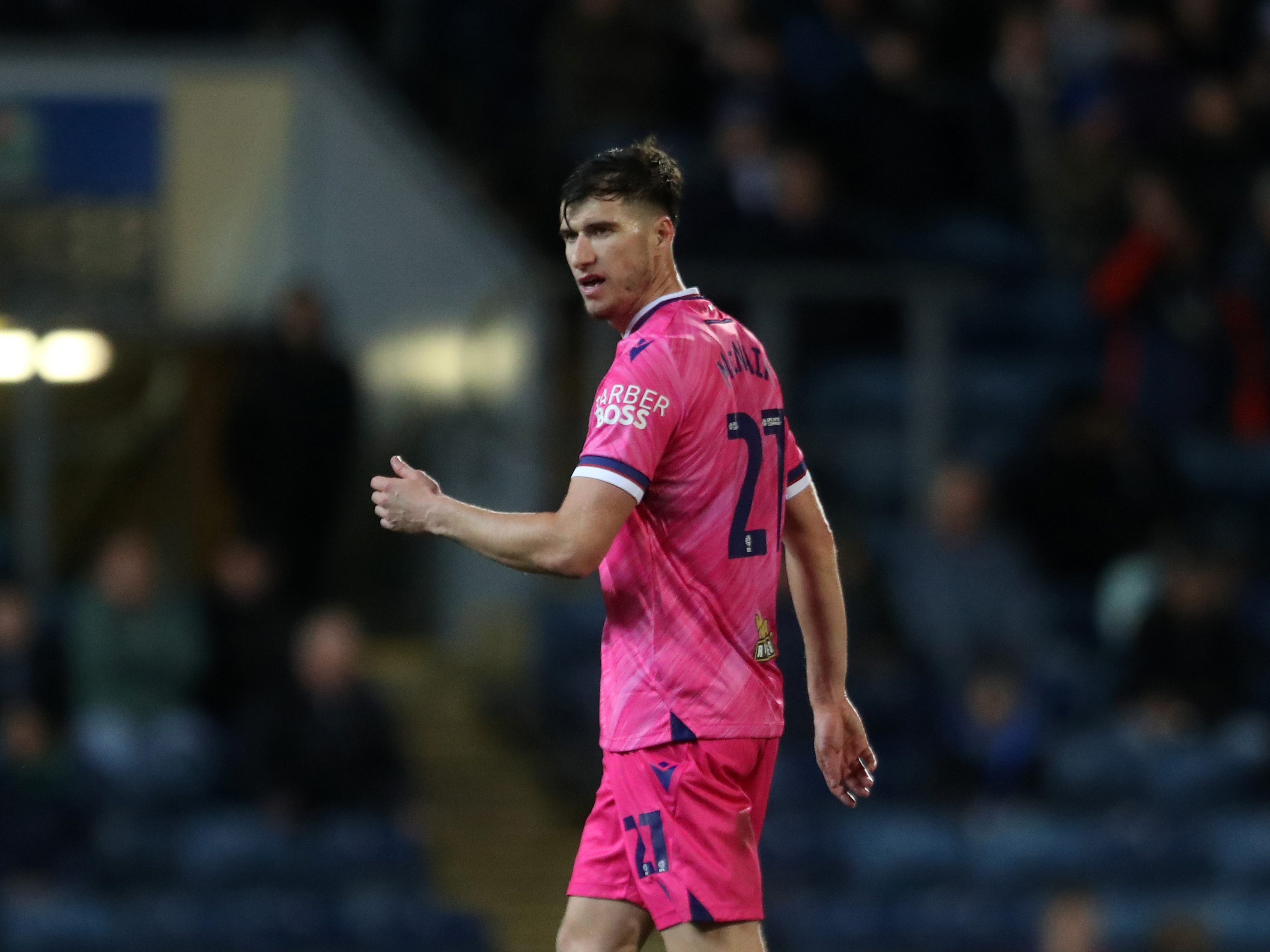 Paddy McNair in action in the pink kit 