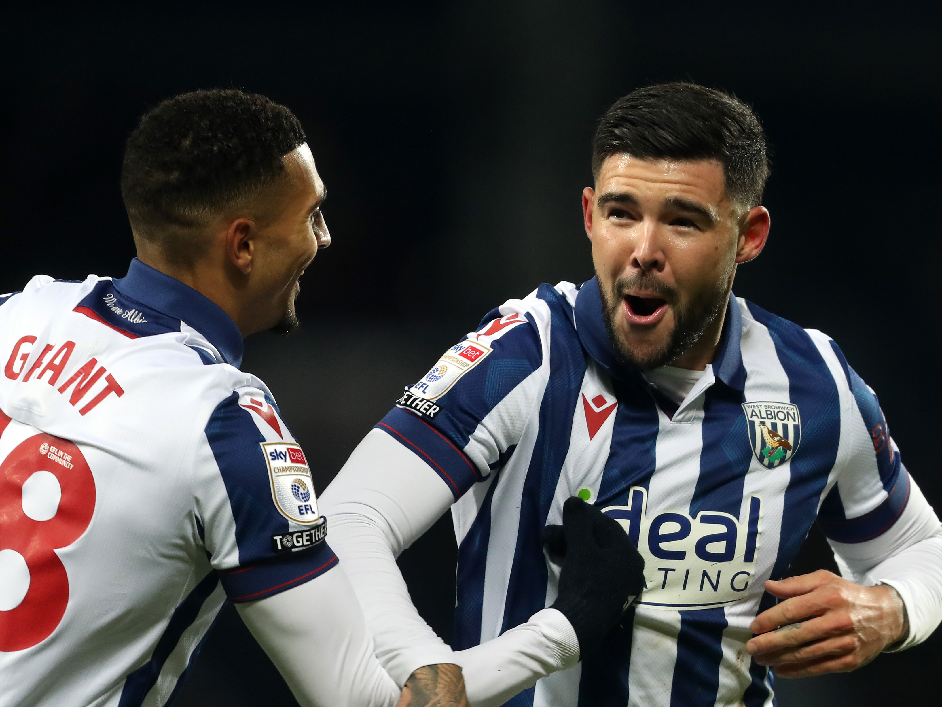 Karlan Grant and Alex Mowatt celebrate a goal against Coventry City in the home kit 