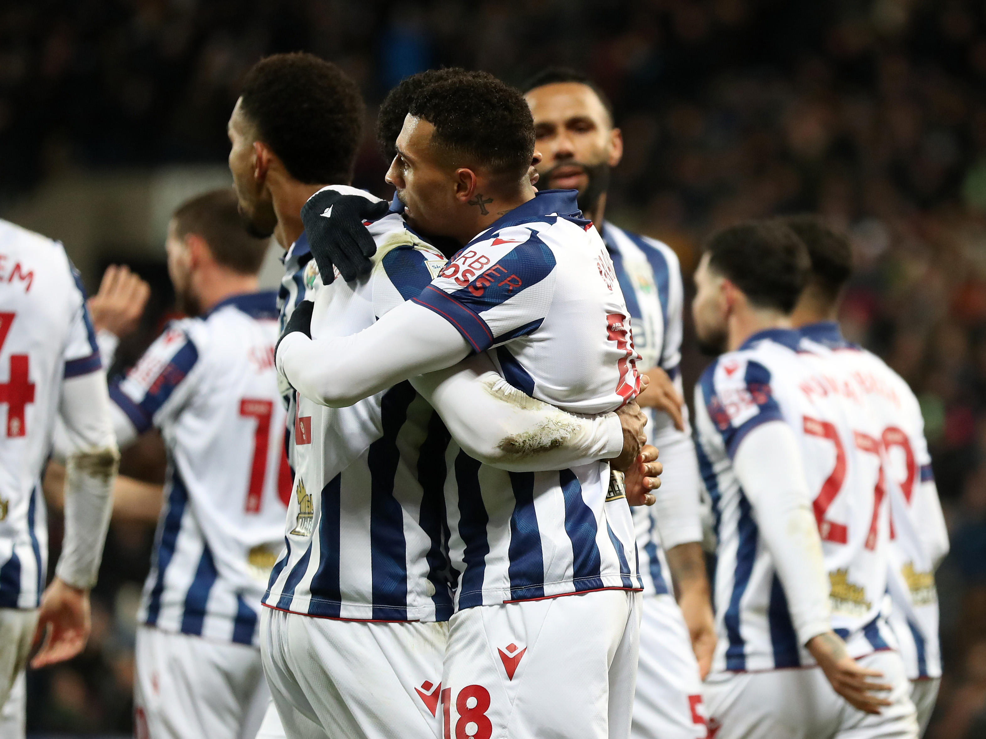 An image of Karlan Grant celebrating a goal against Coventry with his teammates