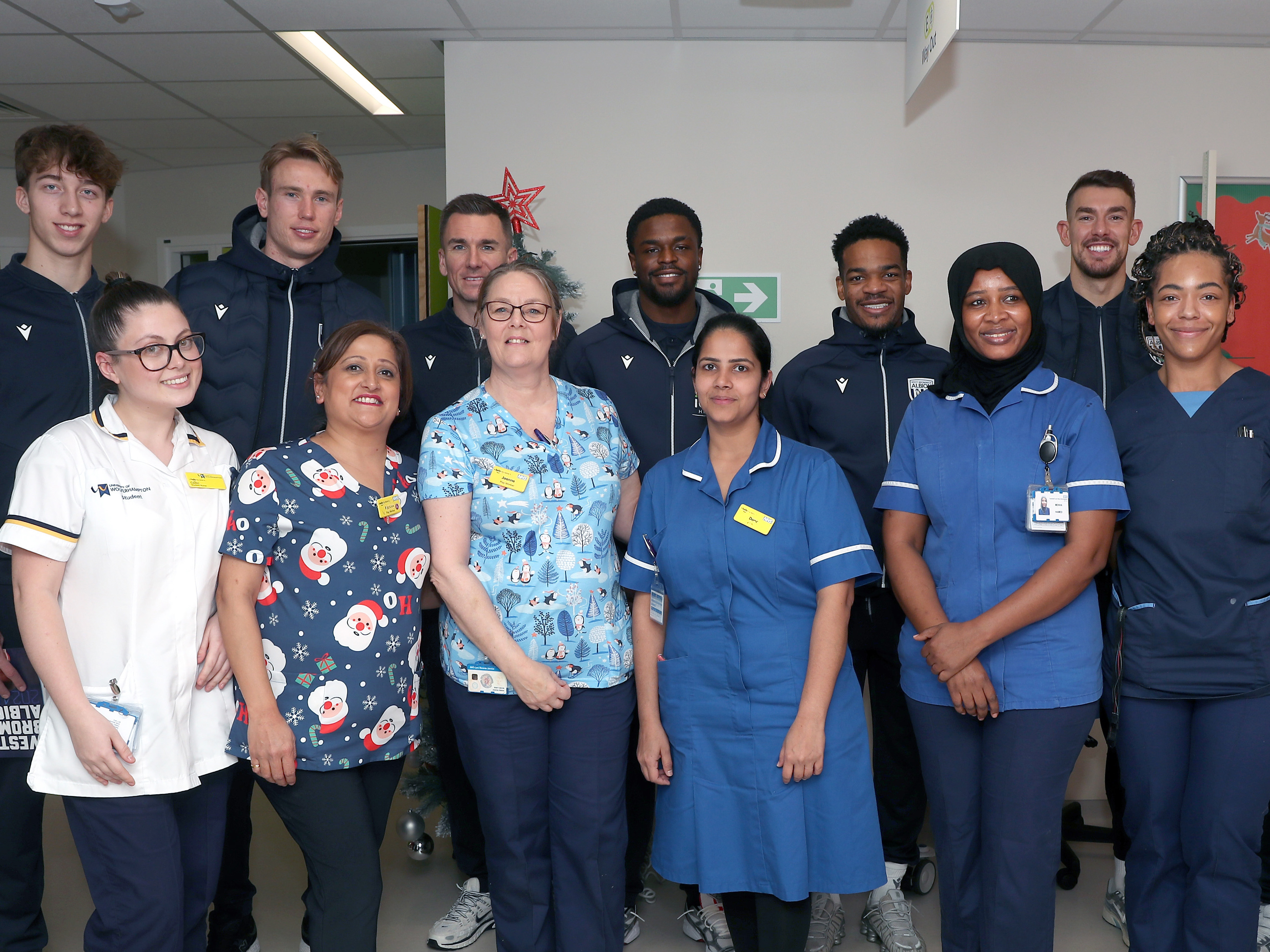 Albion players pose for a photo with NHS staff members at Midlands Metropolitan University Hospital 