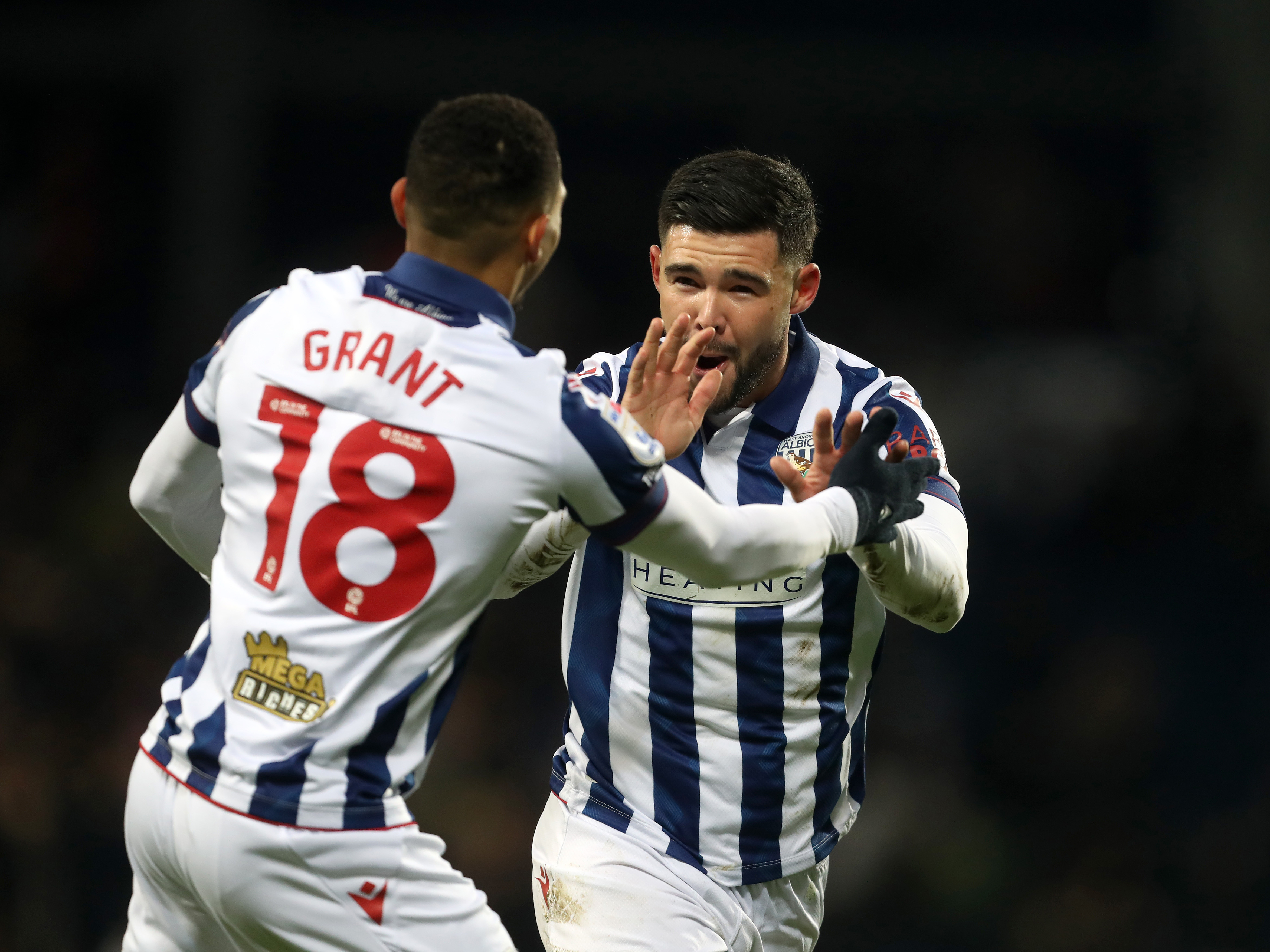 An image of Alex Mowatt celebrating a goal