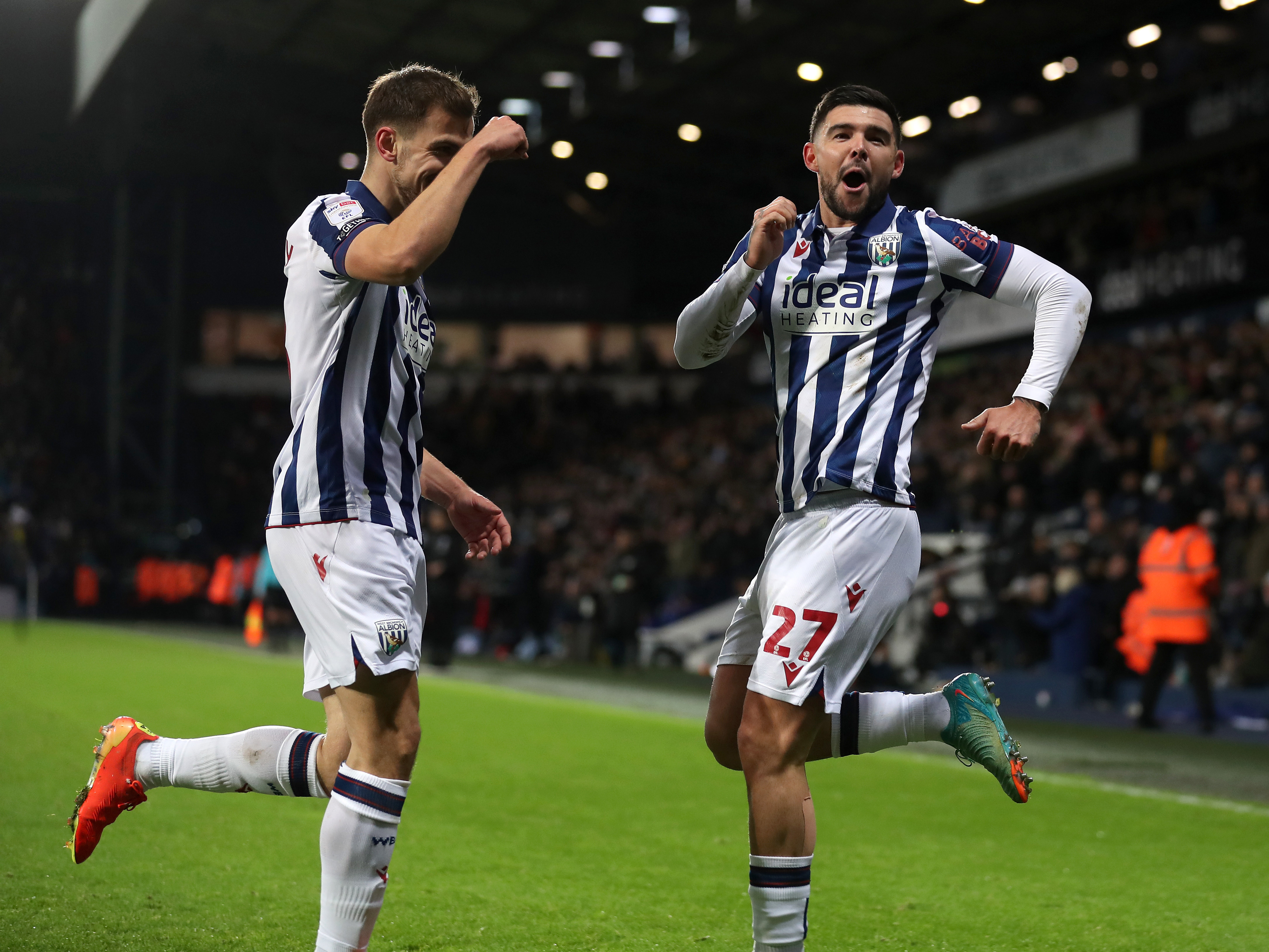 An image of Alex Mowatt celebrating a goal