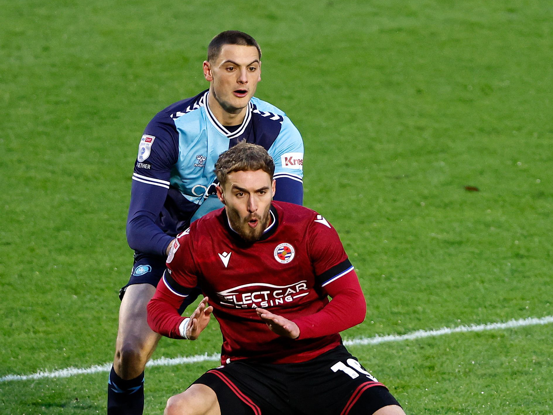 Caleb Taylor in action for Wycombe against Reading 