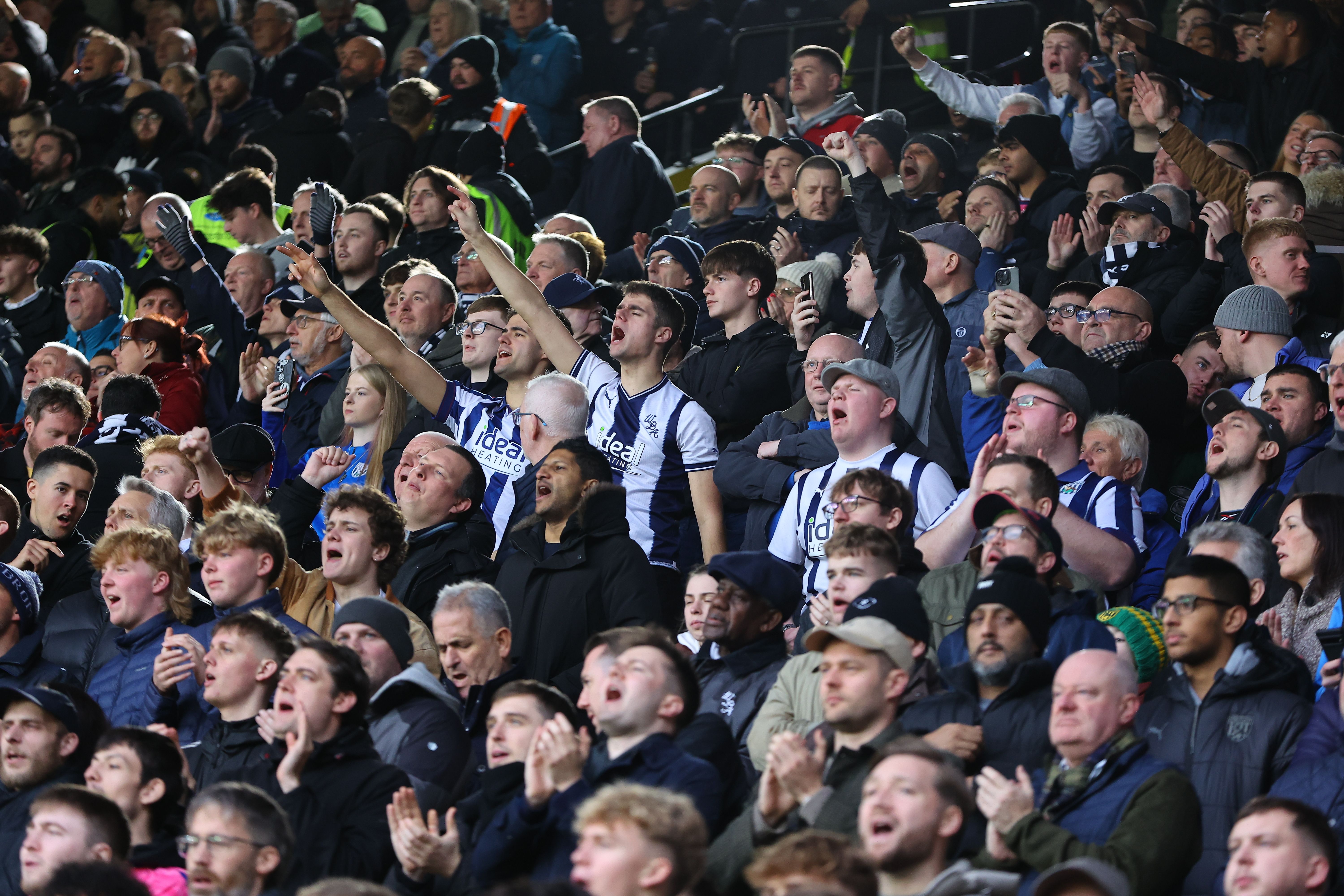 A general view of West Bromwich Albion fans cheering in the stand 