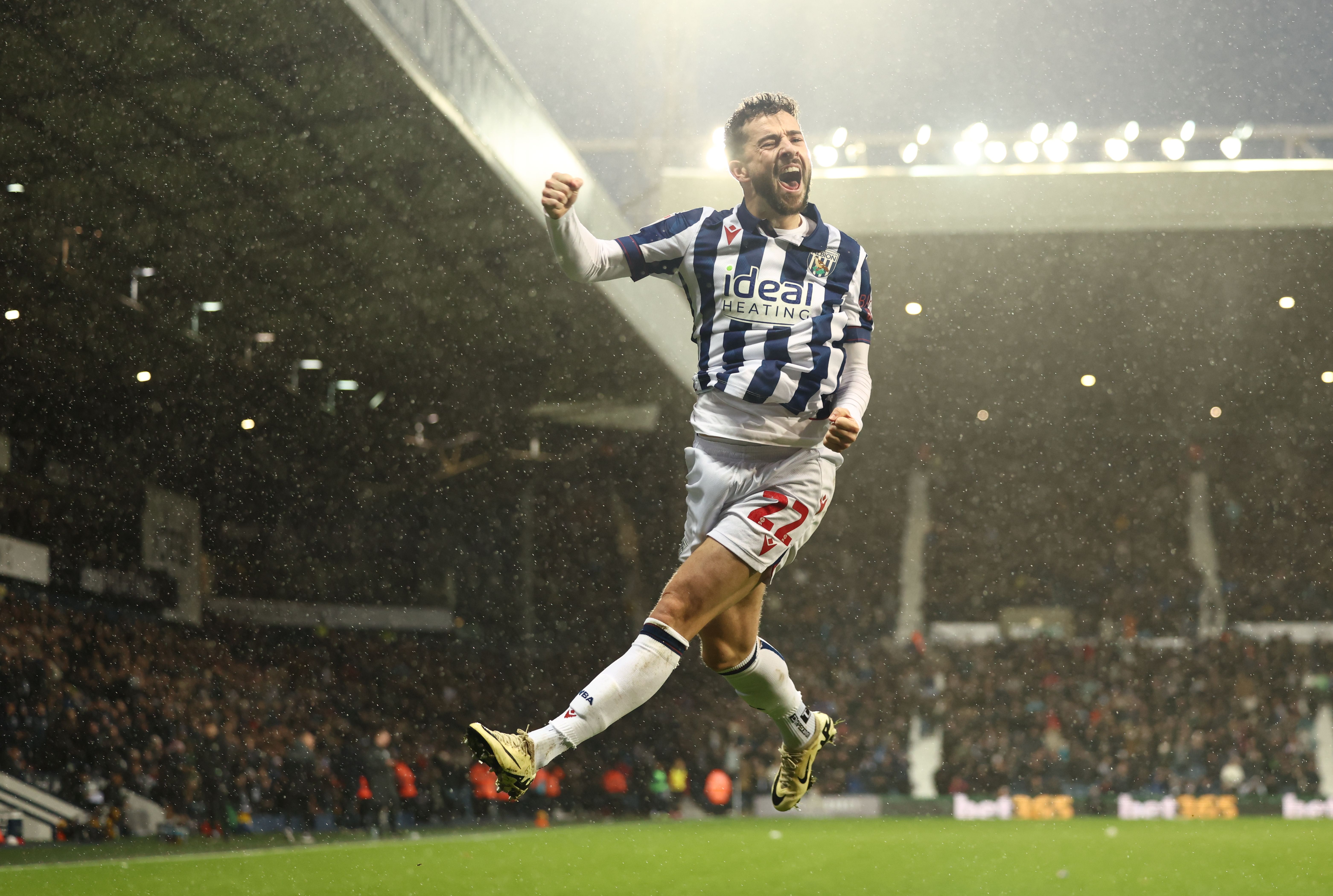 Mikey Johnston celebrates scoring a header against Bristol City 