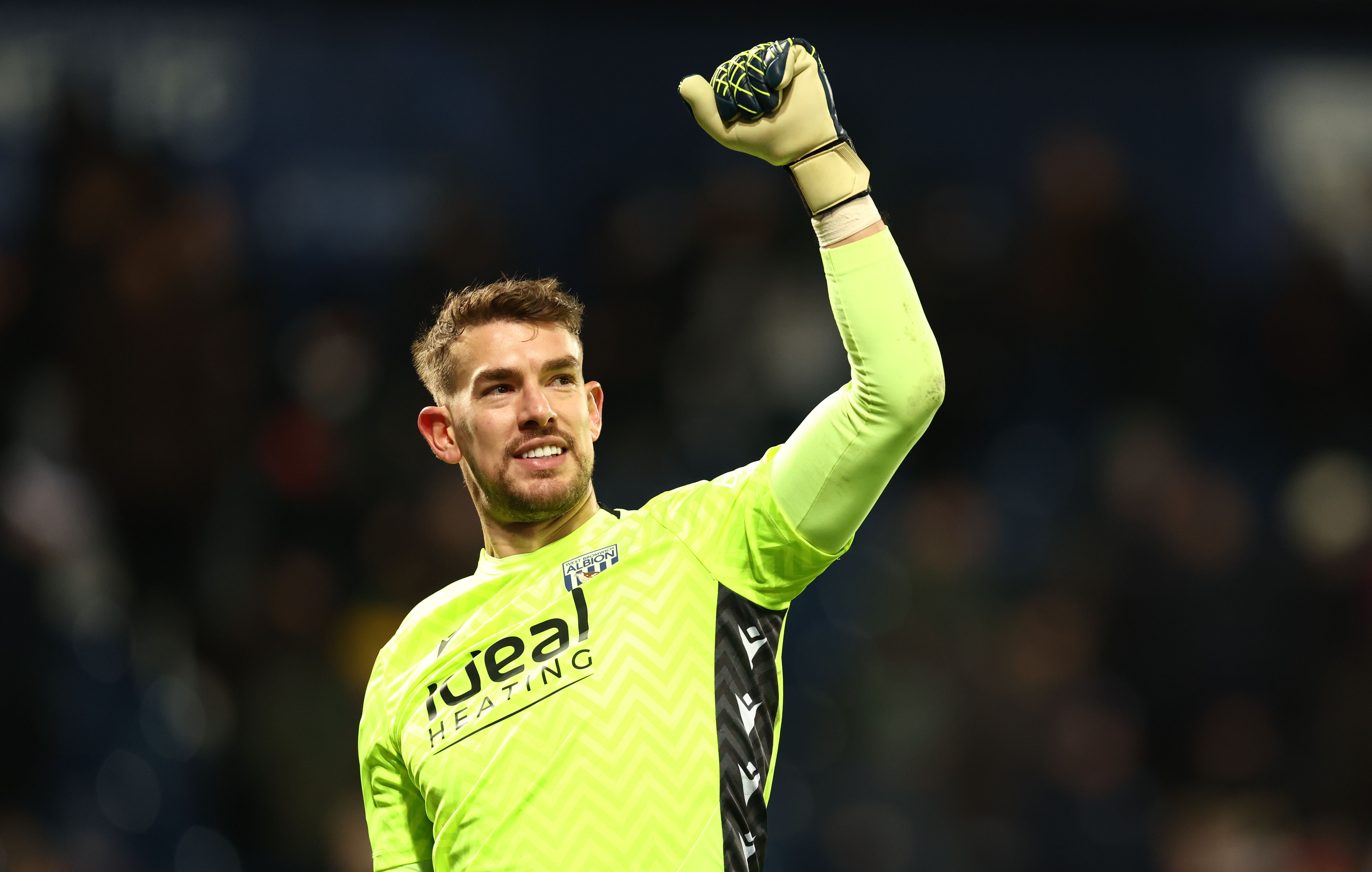 Alex Palmer celebrates beating Bristol City at full time 