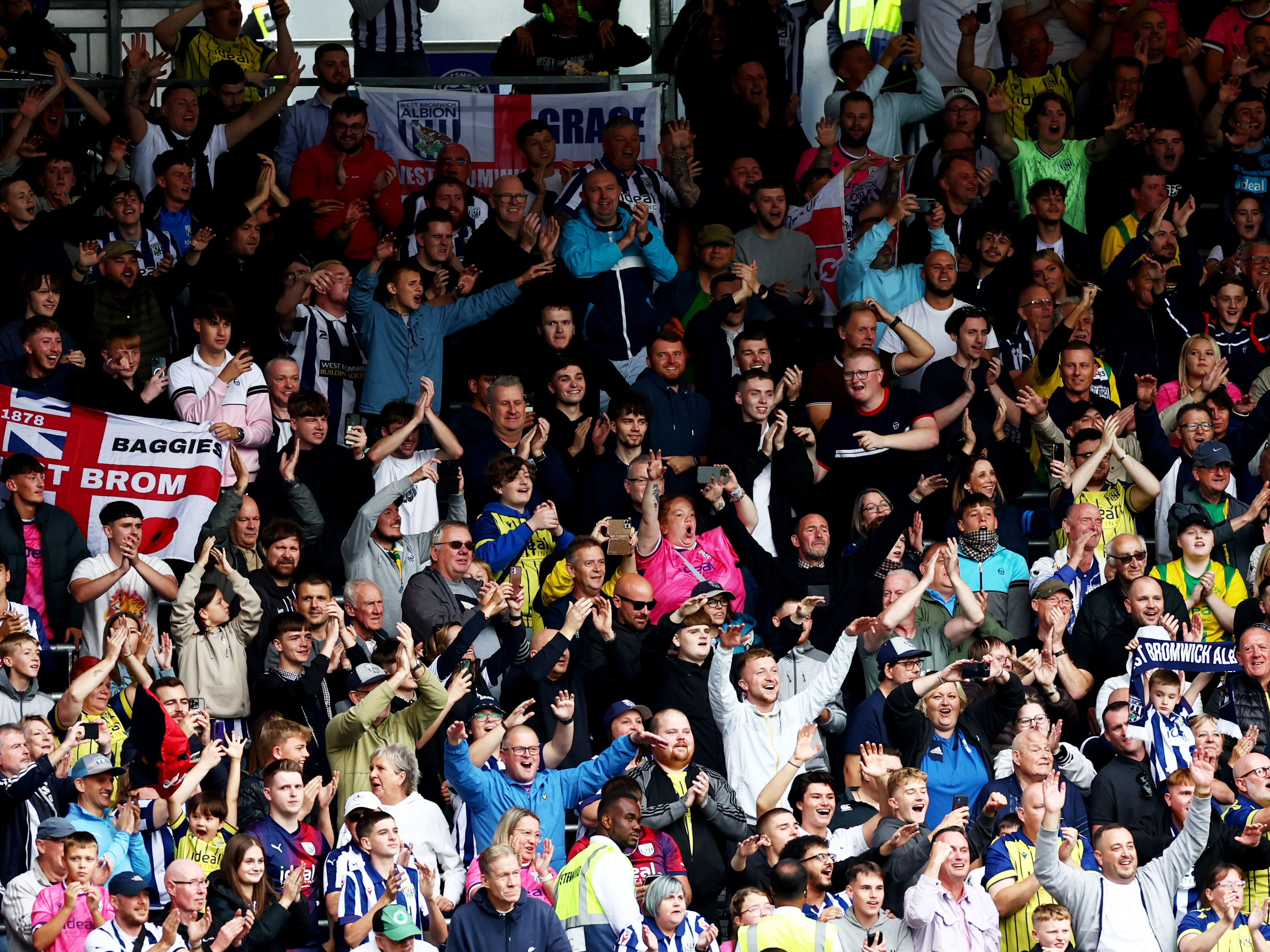 An image of Albion supporters celebrating at Portsmouth