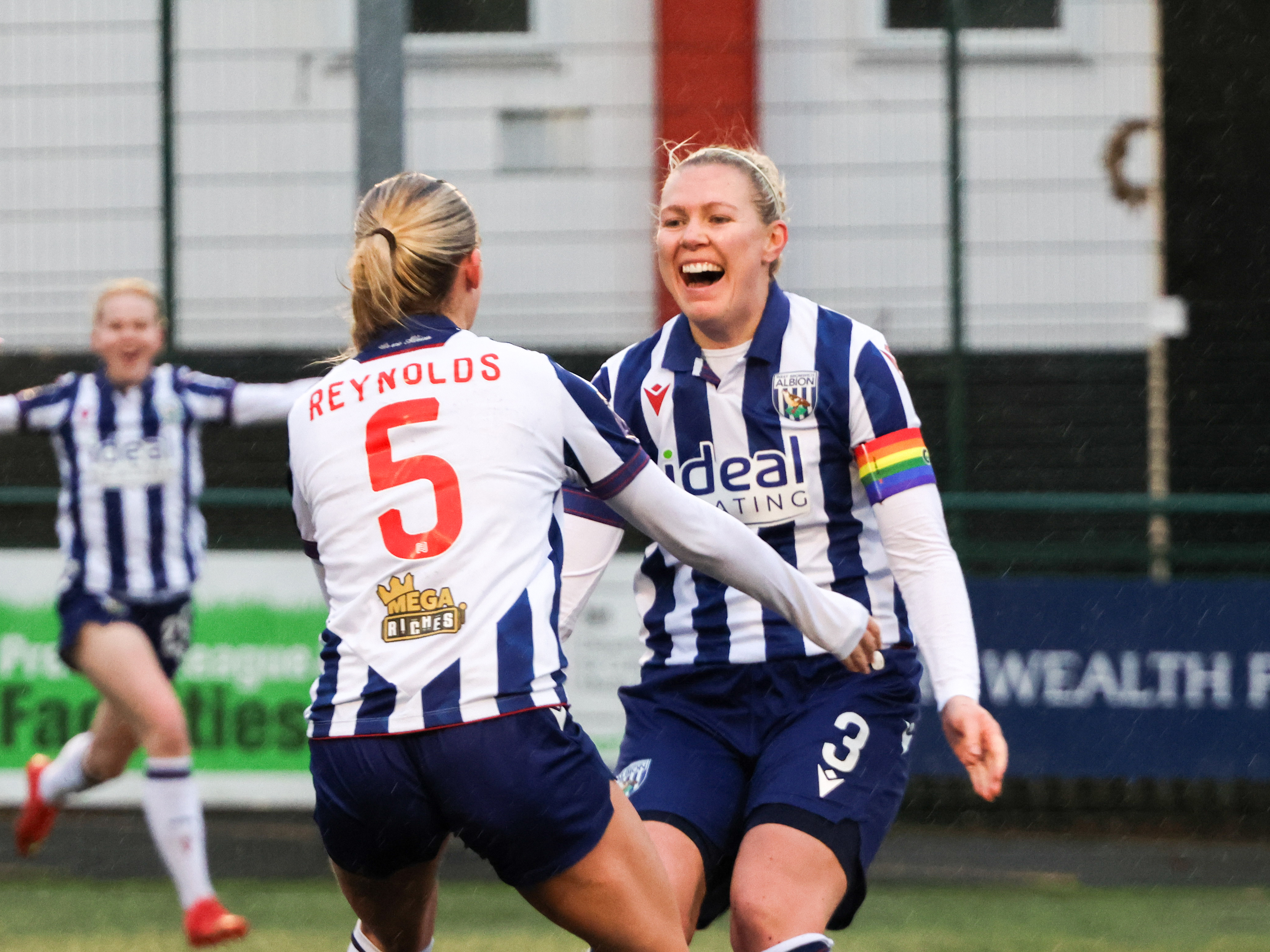 An image of Hannah George celebrating with Taylor Reynolds