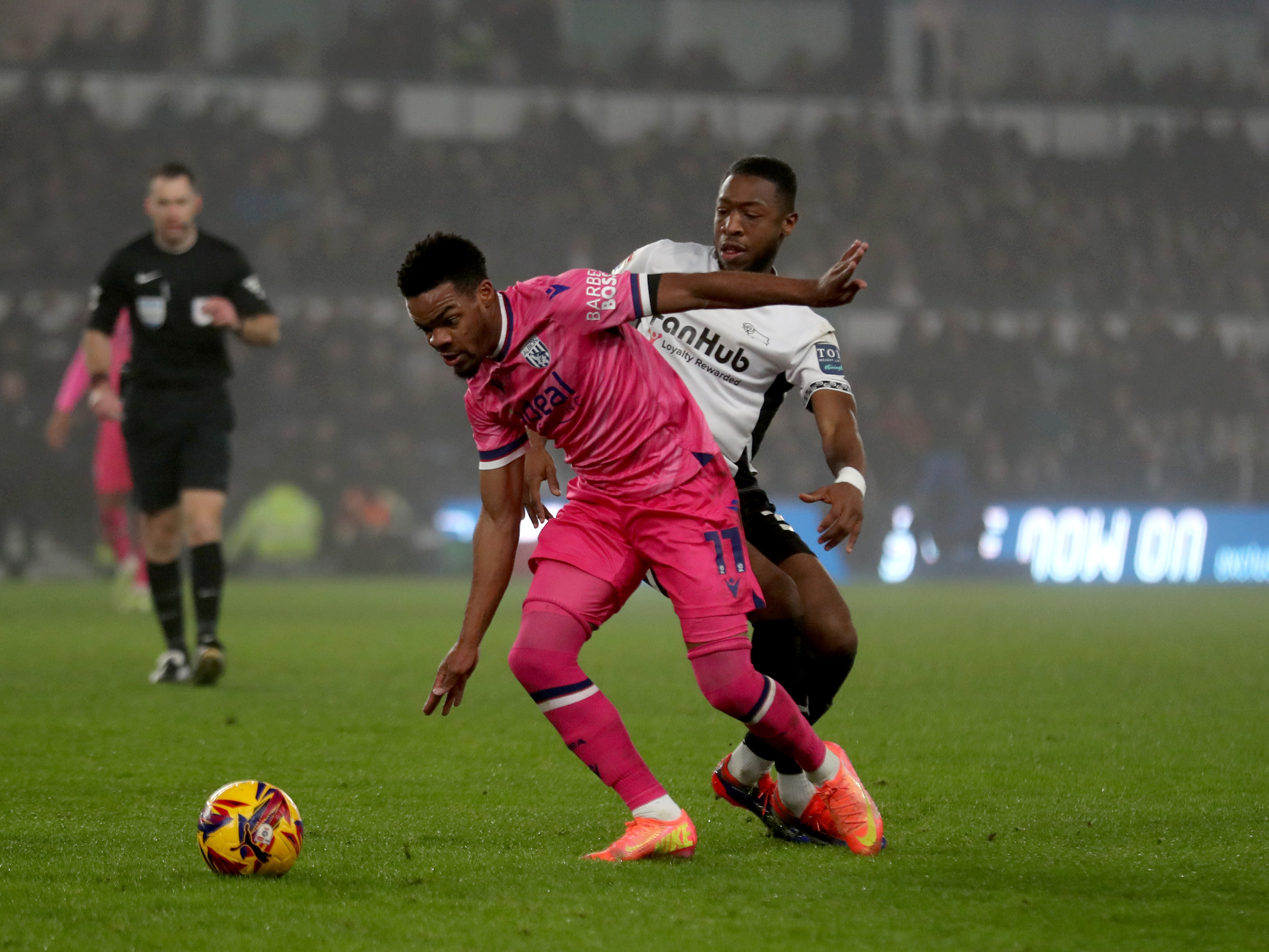 A photo of Grady Diangana in the pink away kit