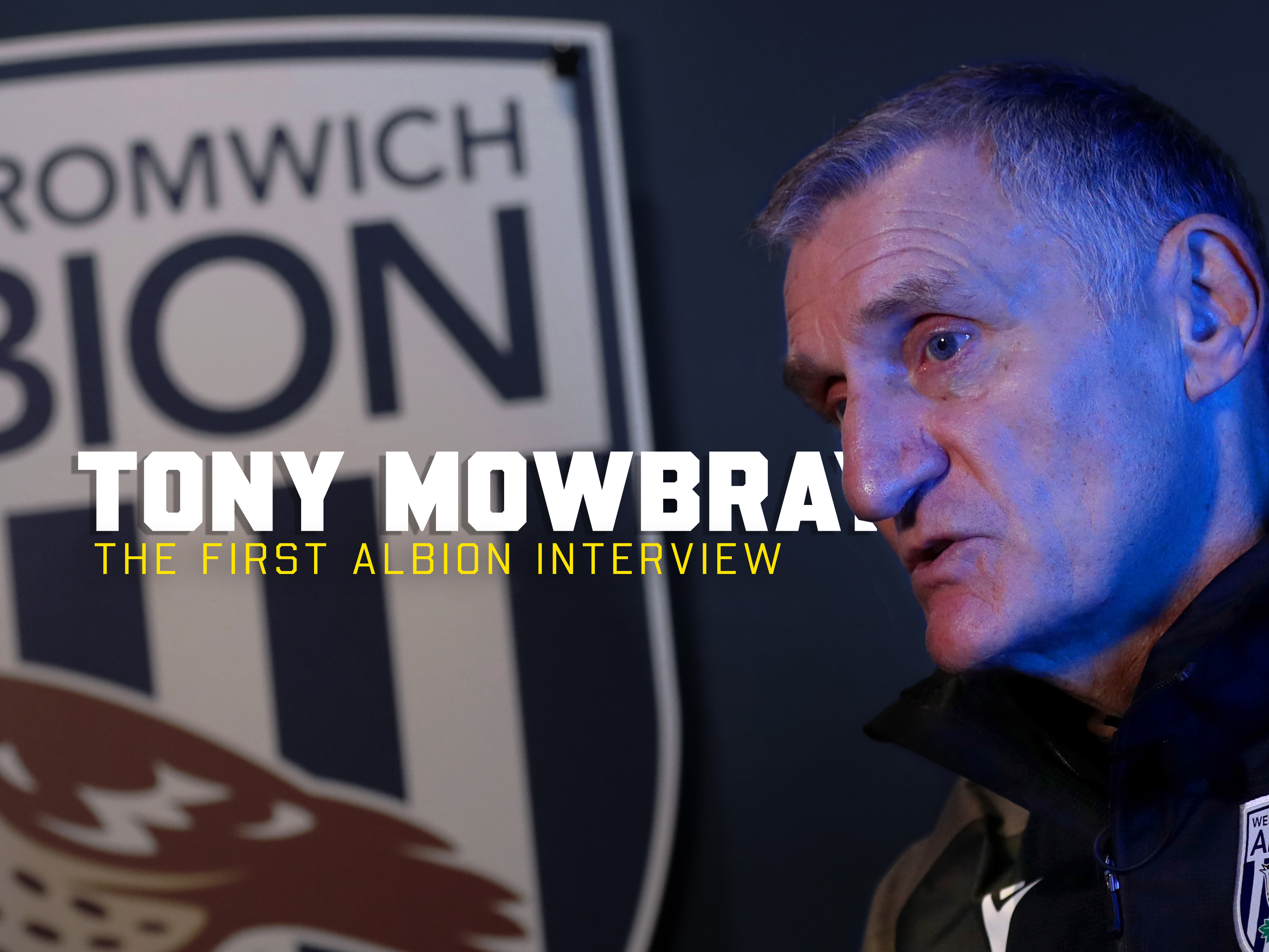 Tony Mowbray's first WBA TV interview graphic with an image of him in front of a WBA badge