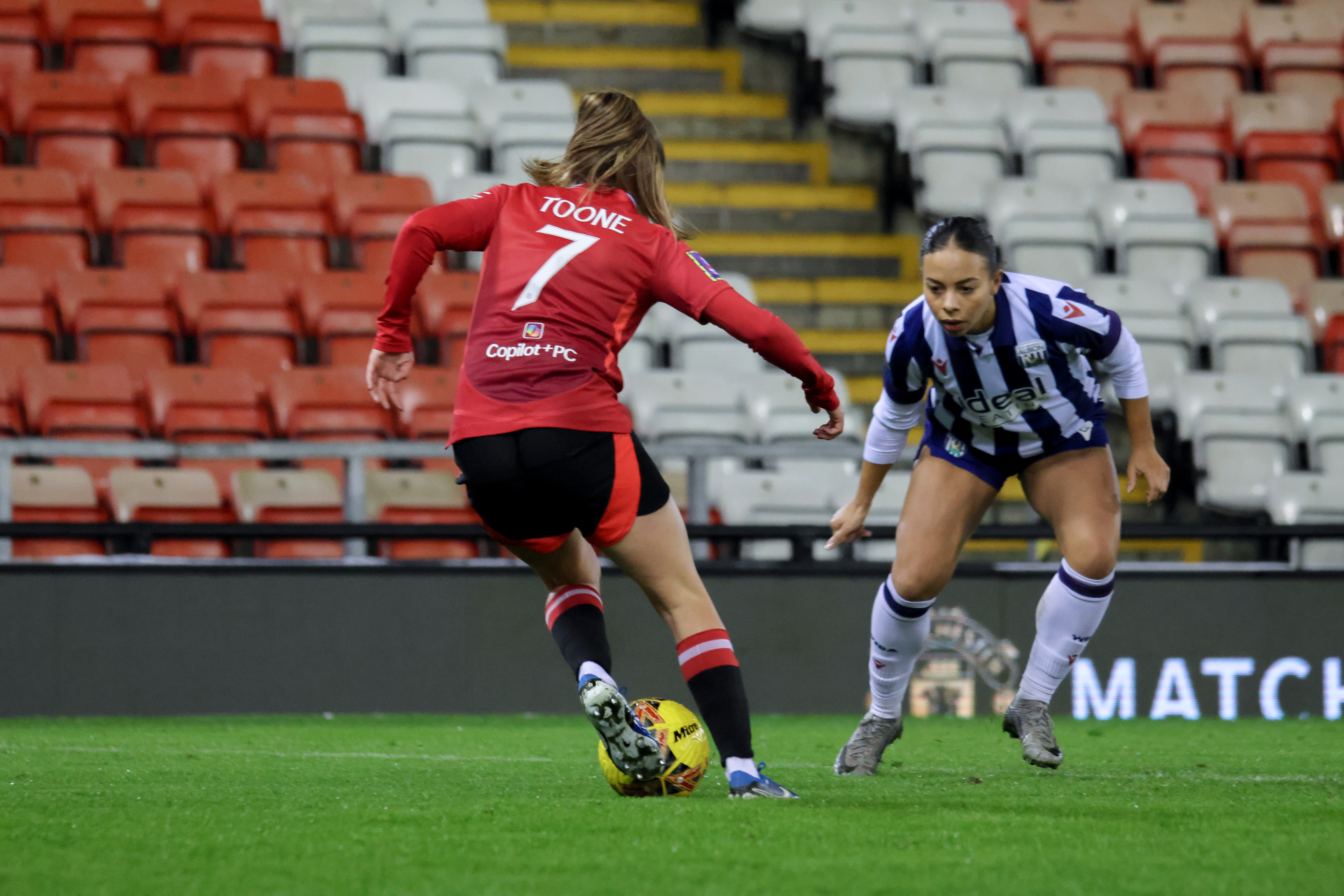 Ash Brown in action against Man United