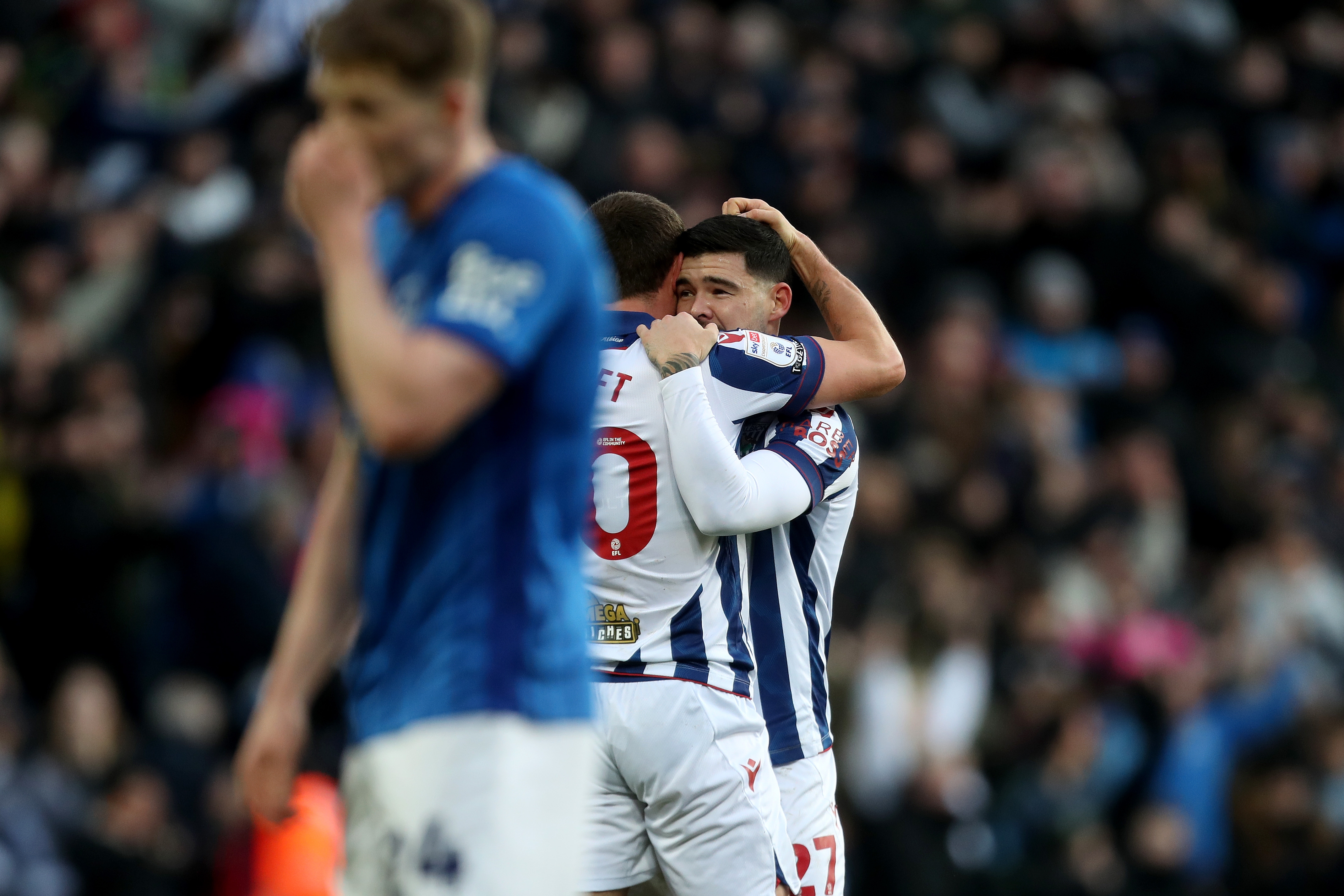 Alex Mowatt celebrates with John Swift after scoring against Portsmouth