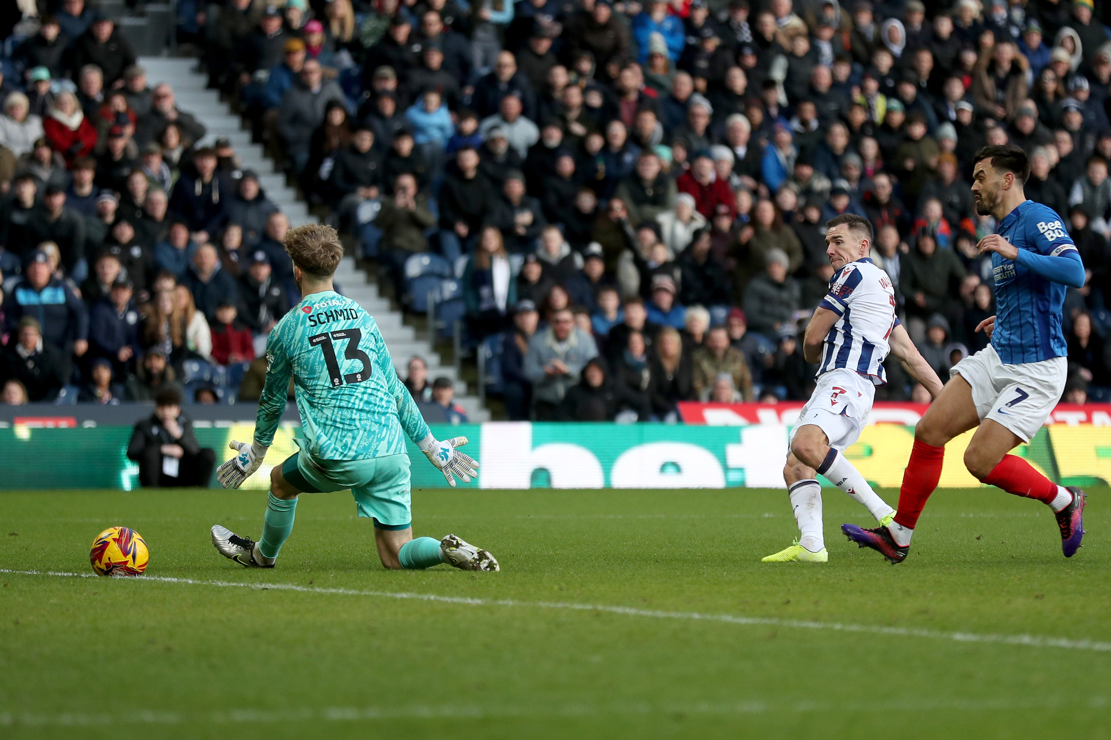 Jed Wallace shoots and scores against Portsmouth at The Hawthorns